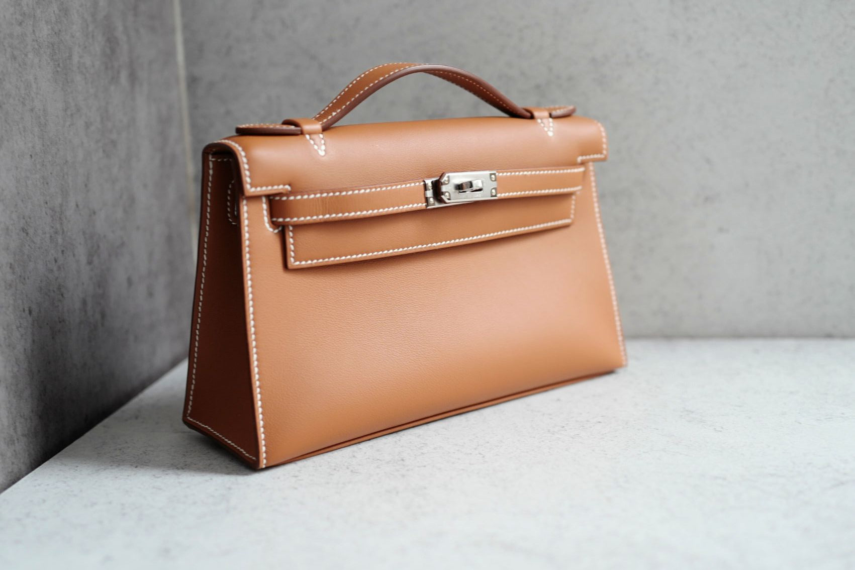 Hermès Kelly Pochette Gold Swift Leather Palladium Hardware K Stamp