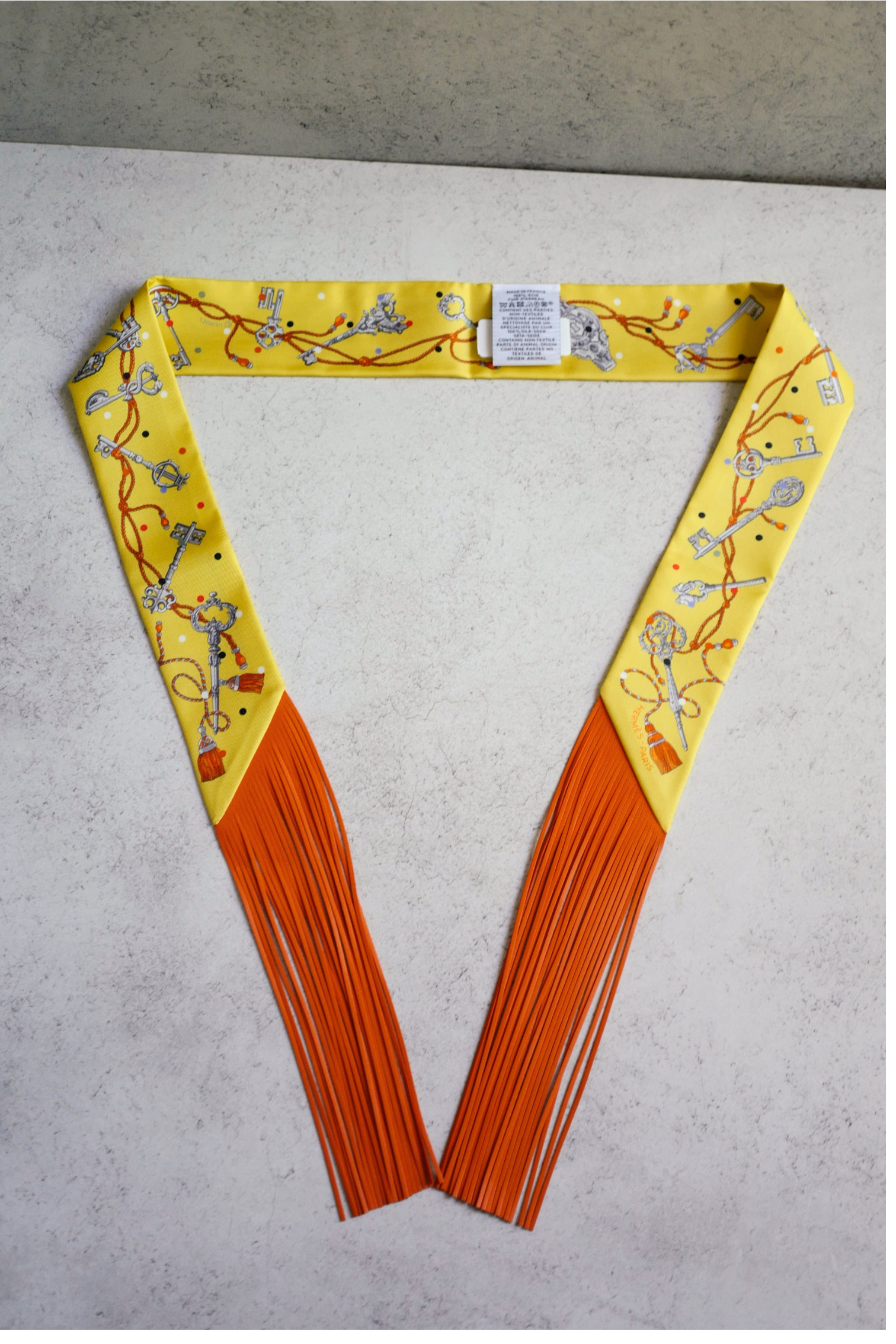 Hermès Twilly Les Cles a Pois Leather Fringes Jaune/Argent /Orange vif Silk