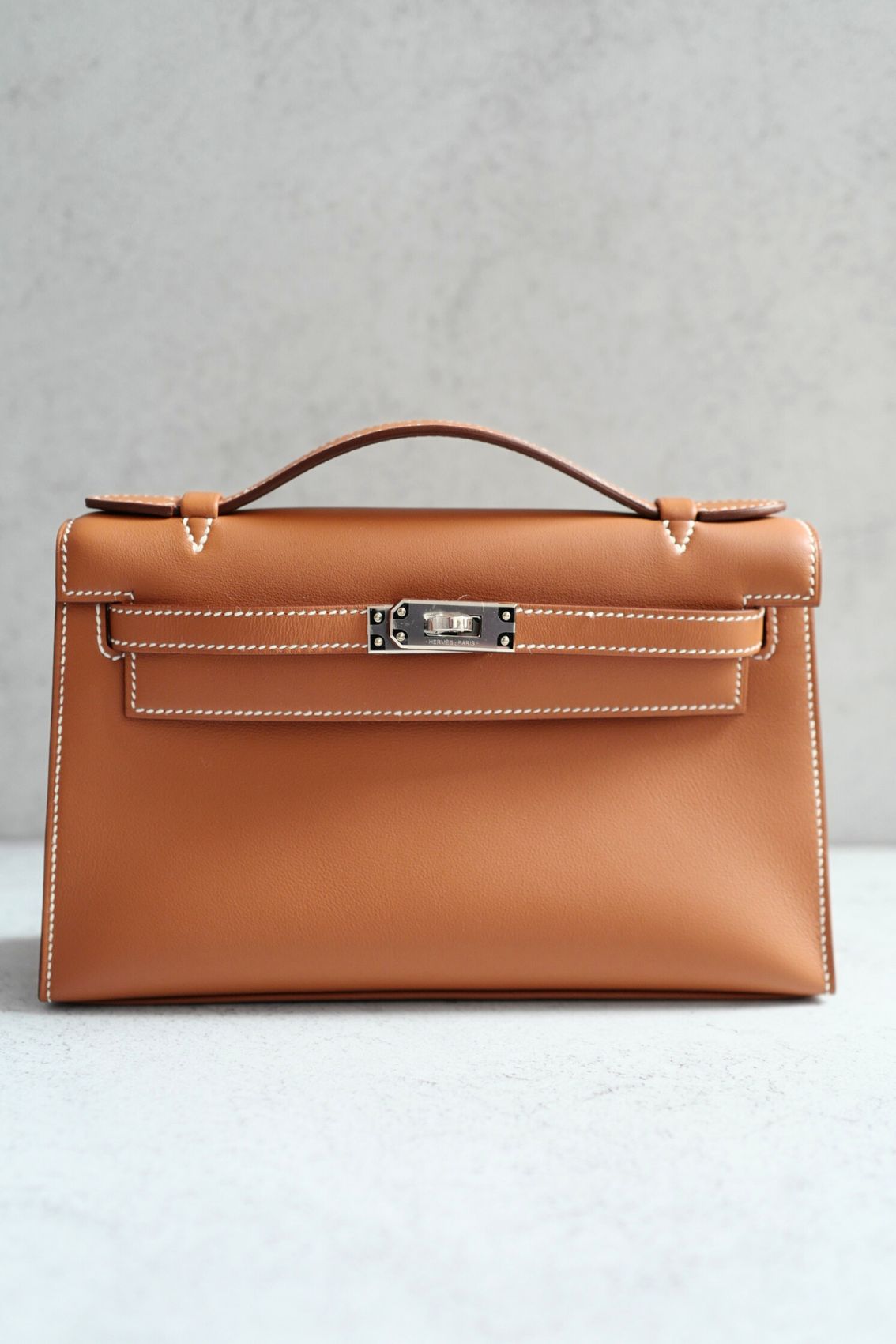 Hermès Kelly Pochette Gold Swift Leather Palladium Hardware K Stamp
