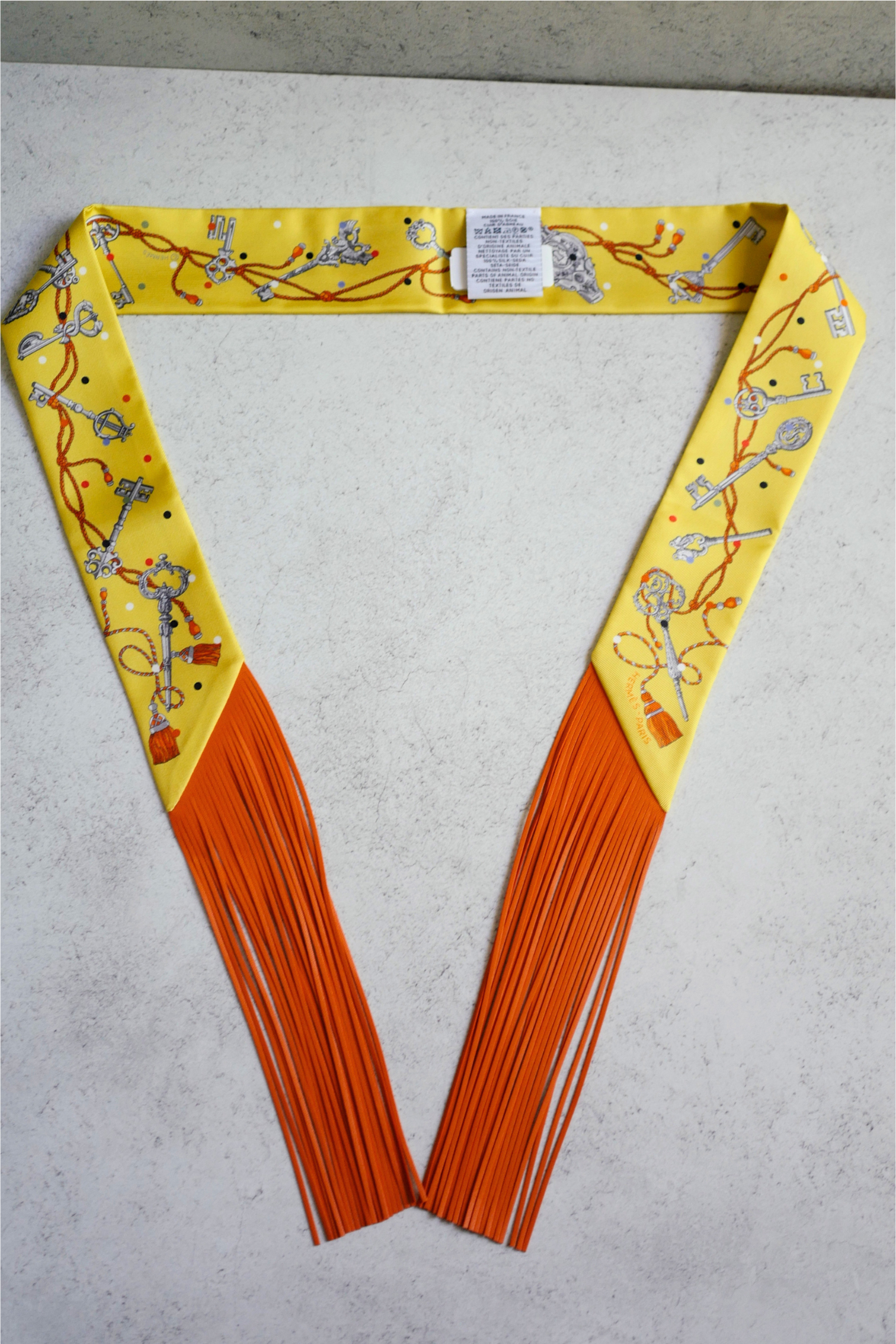 Hermès Twilly Les Cles a Pois Leather Fringes Jaune/Argent /Orange vif Silk