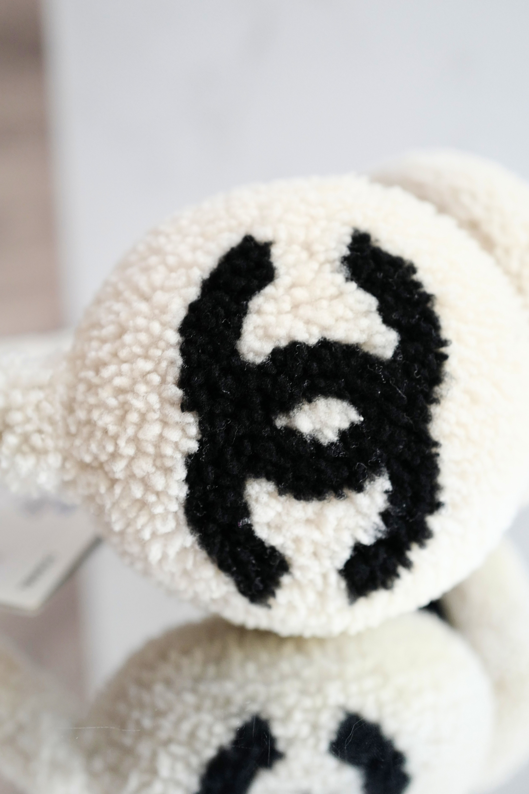 BNIB Chanel CC Earmuffs in Shearling Wool Ecru/Black