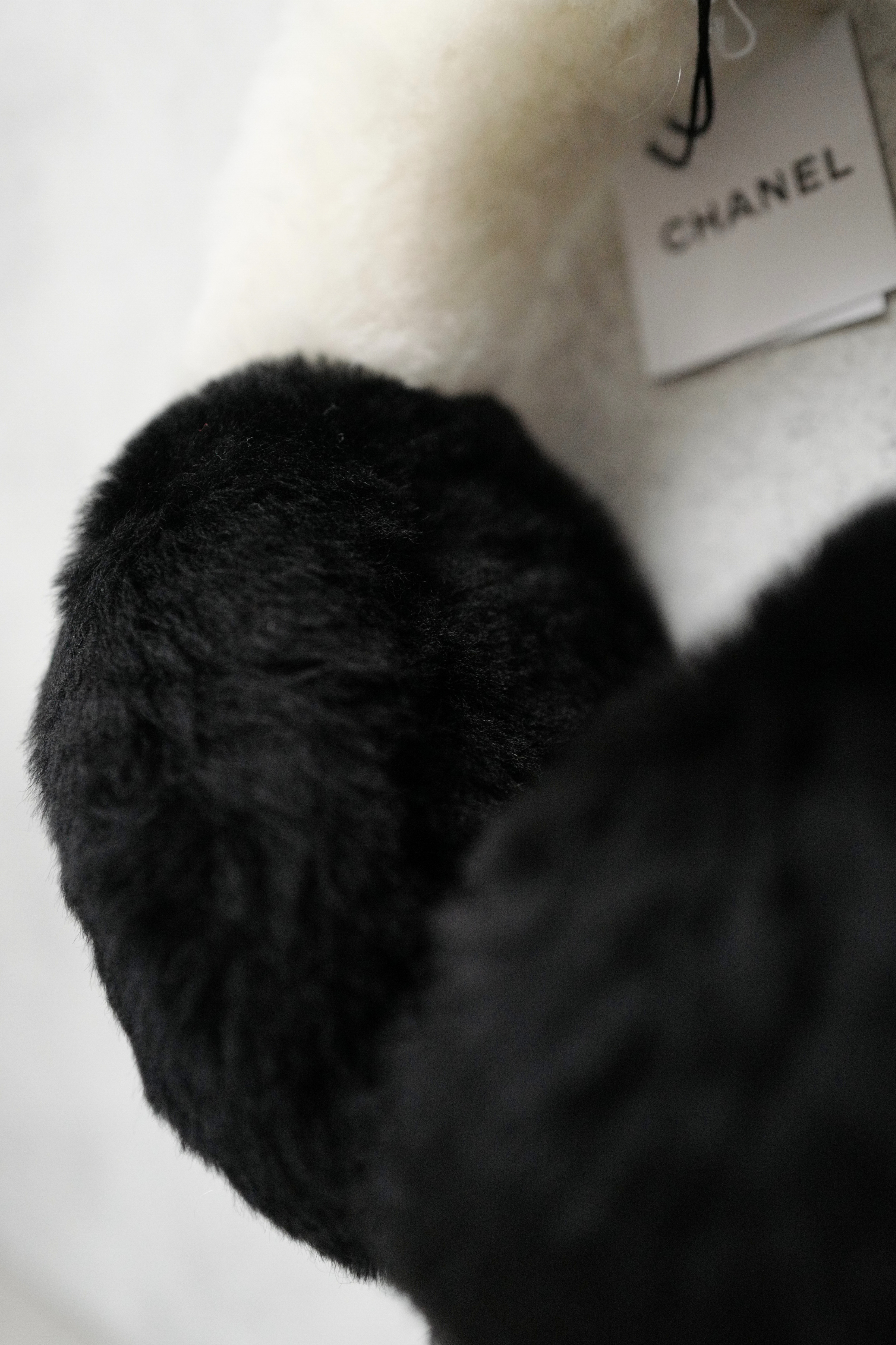 BNIB Chanel 25N Coco Neige Shearling Earmuffs in Black and White