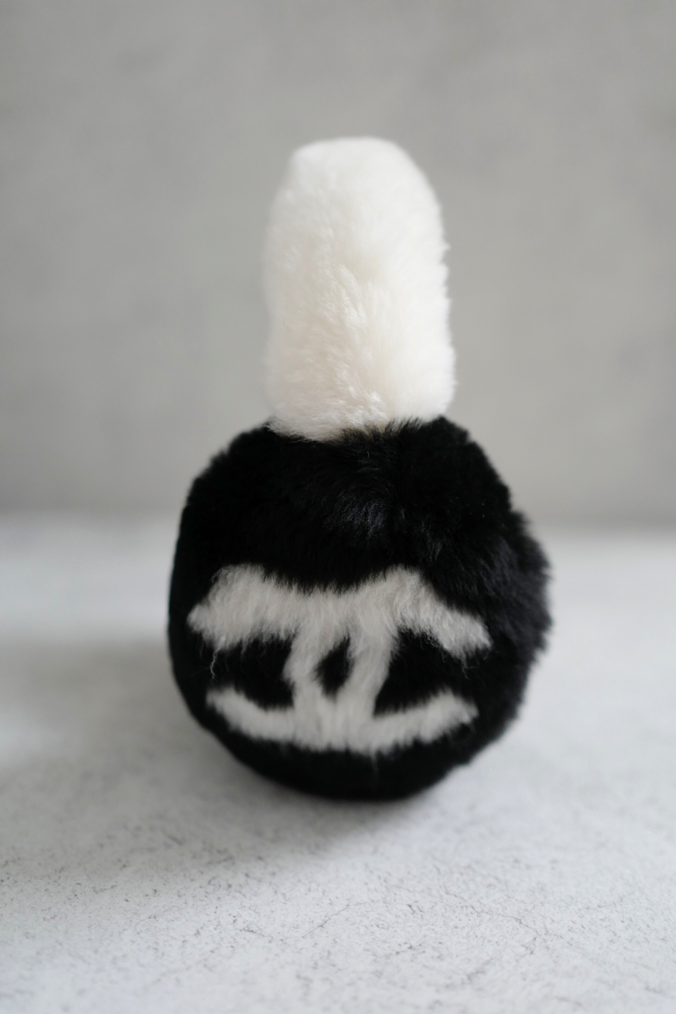 BNIB Chanel 25N Coco Neige Shearling Earmuffs in Black and White