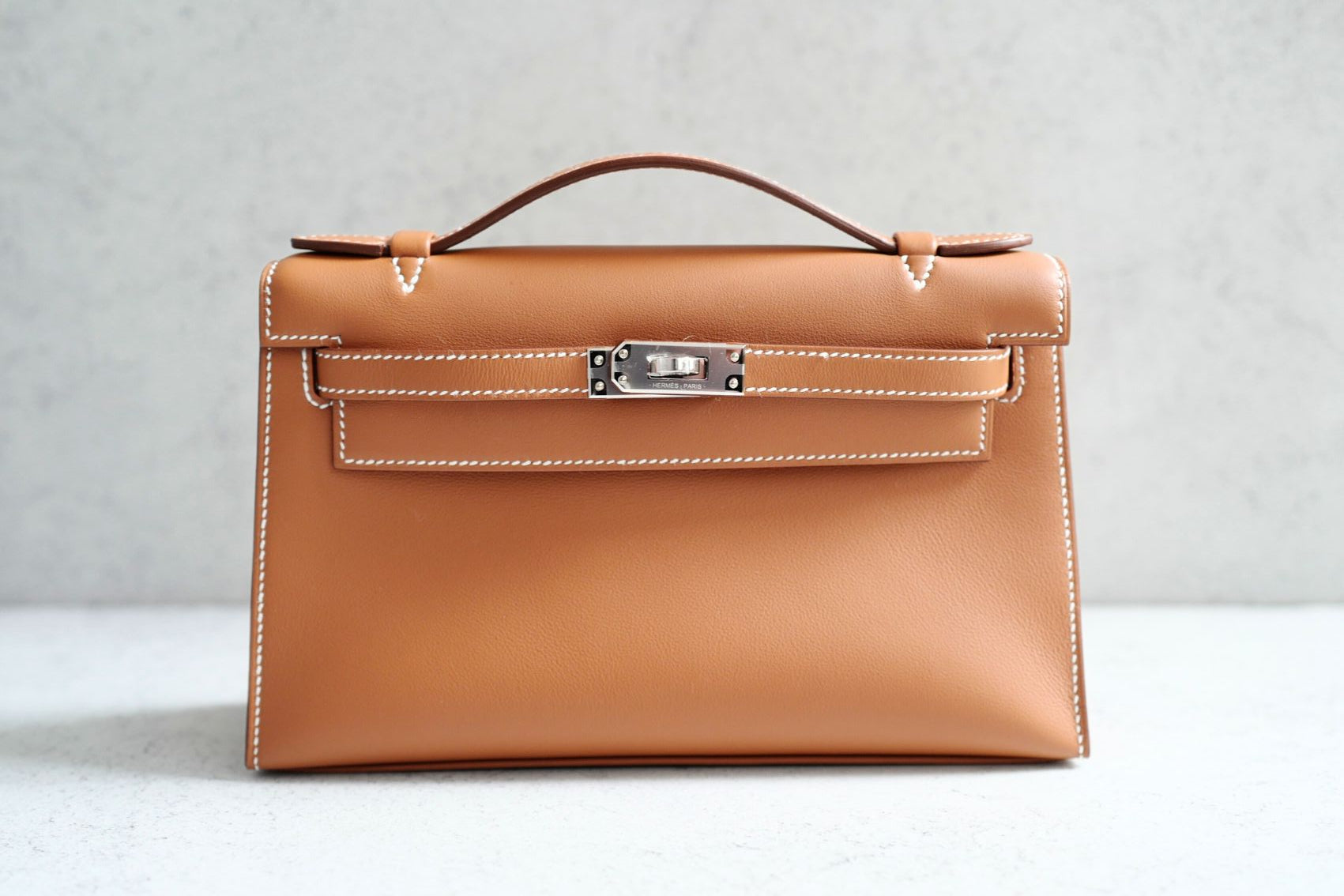 Hermès Kelly Pochette Gold Swift Leather Palladium Hardware K Stamp