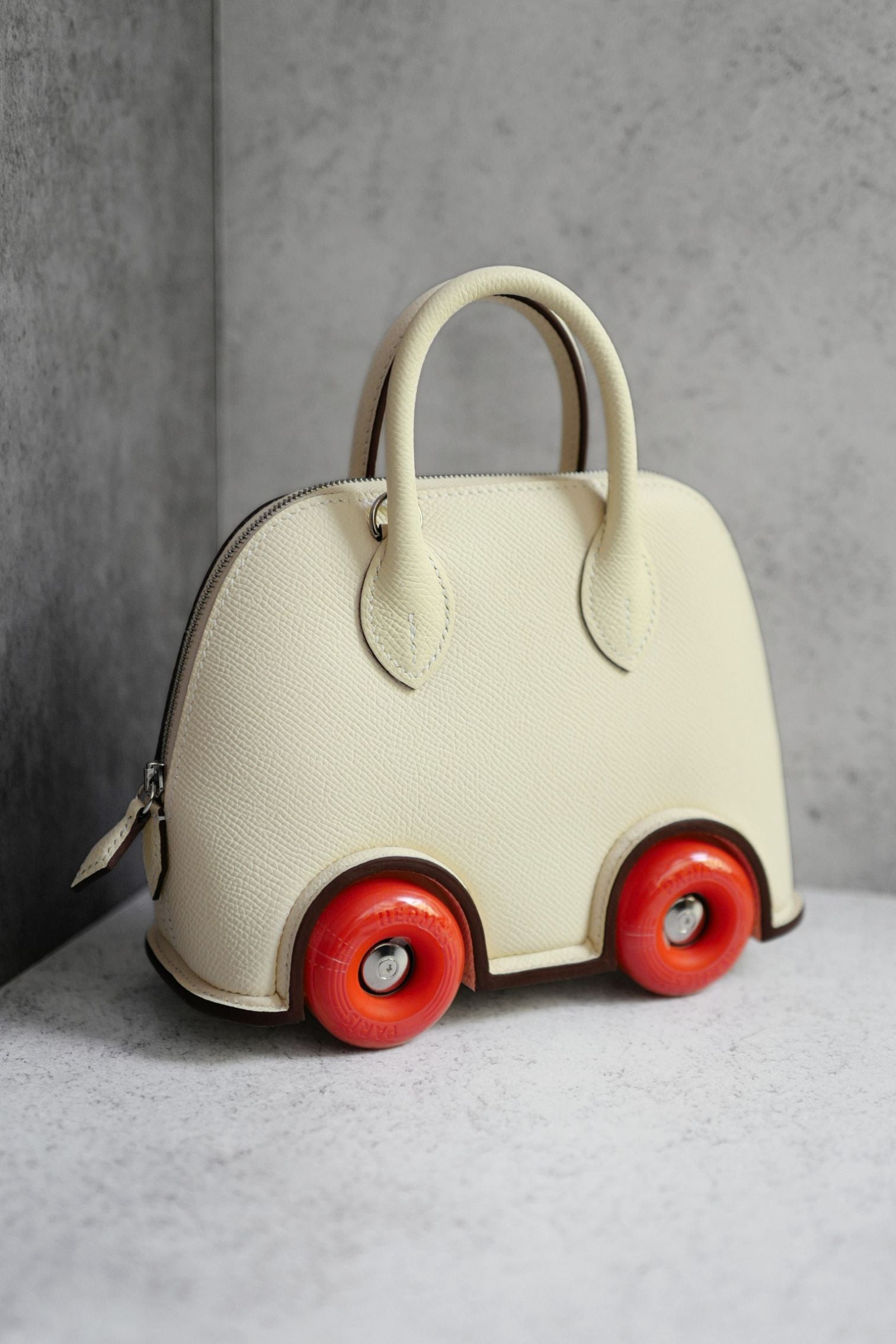 Hermès Bolide on Wheels Bag Nata Orange Epsom Calfskin Palladium HW G Stamp