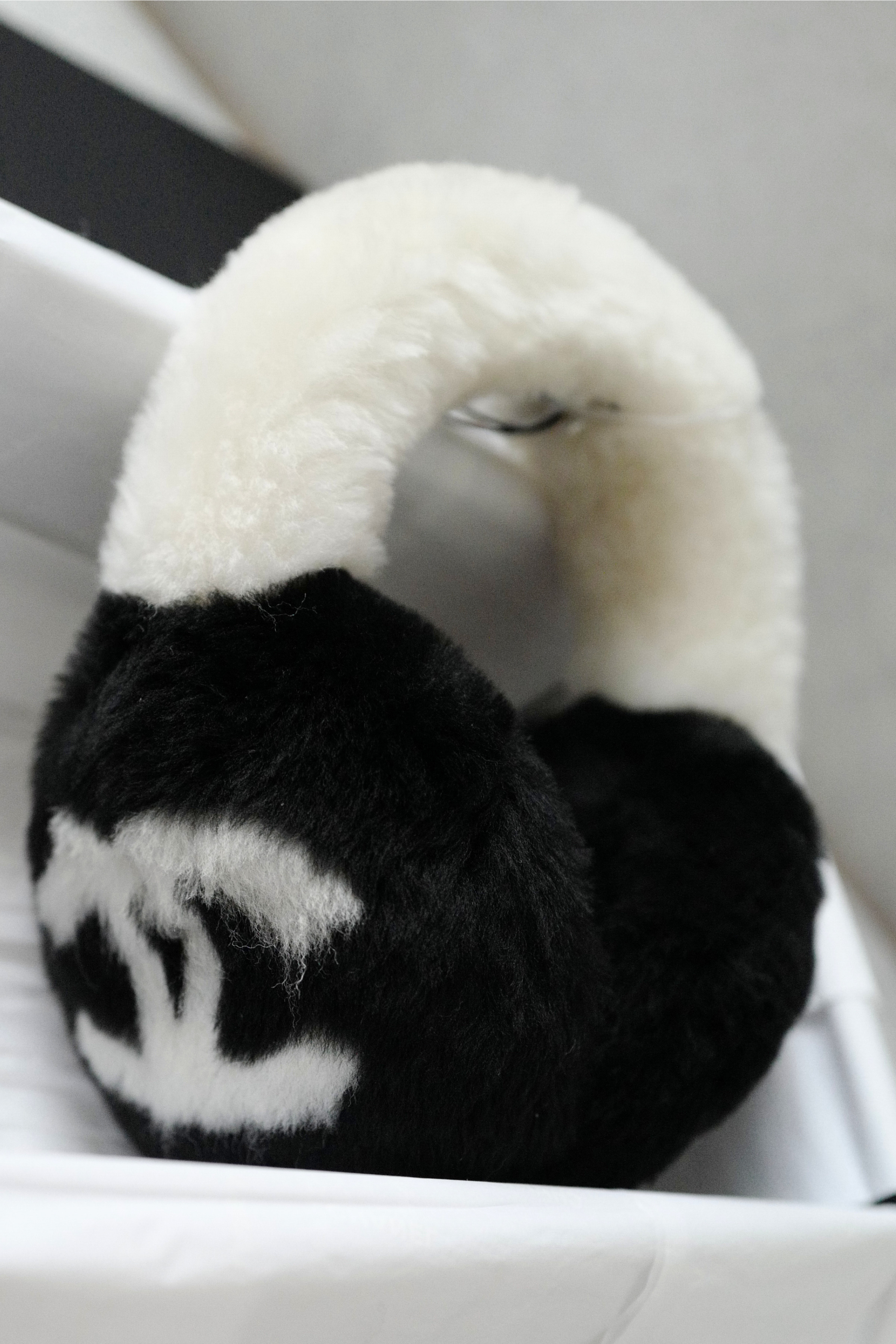 BNIB Chanel 25N Coco Neige Shearling Earmuffs in Black and White