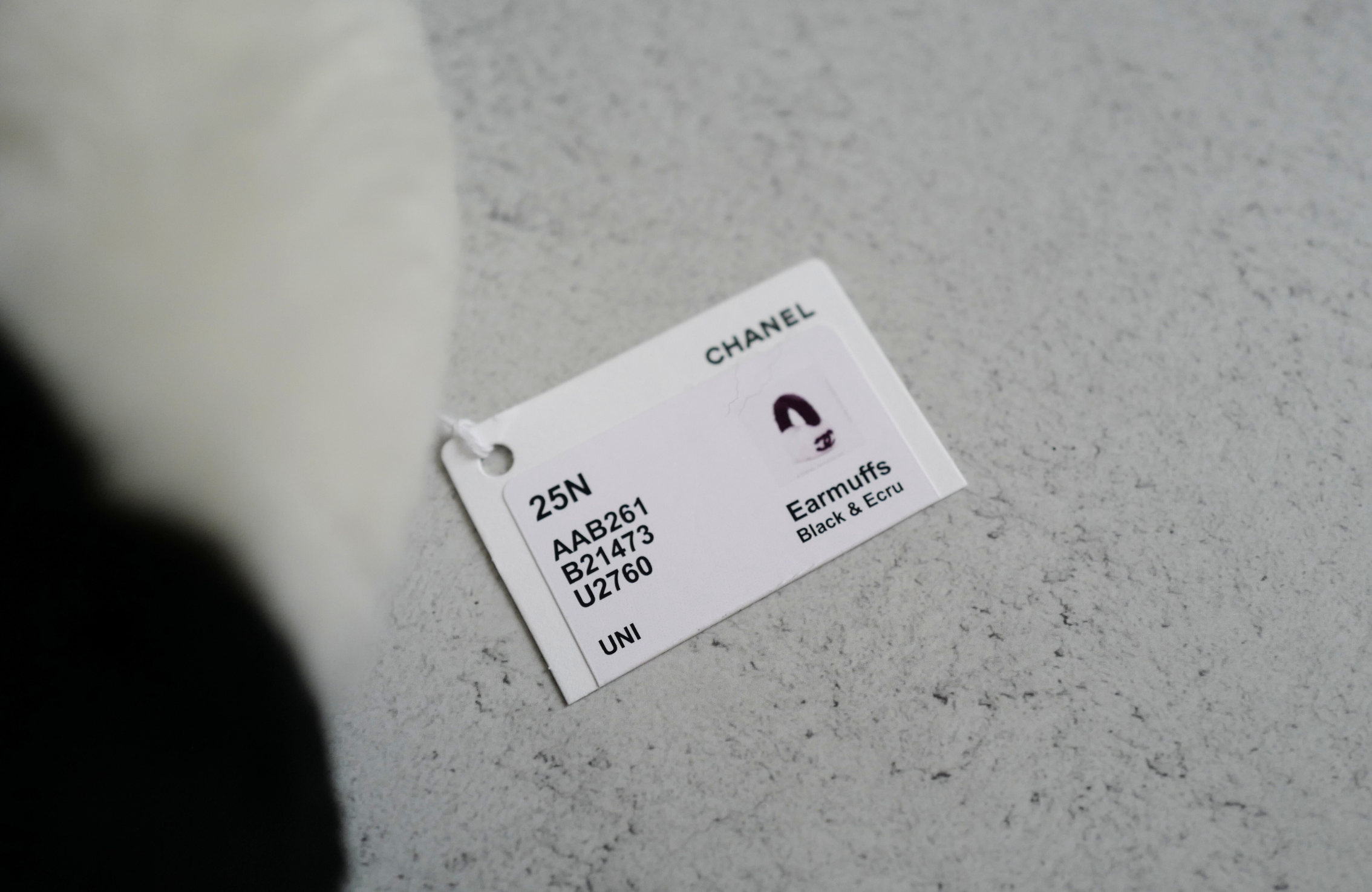 BNIB Chanel 25N Coco Neige Shearling Earmuffs in Black and White