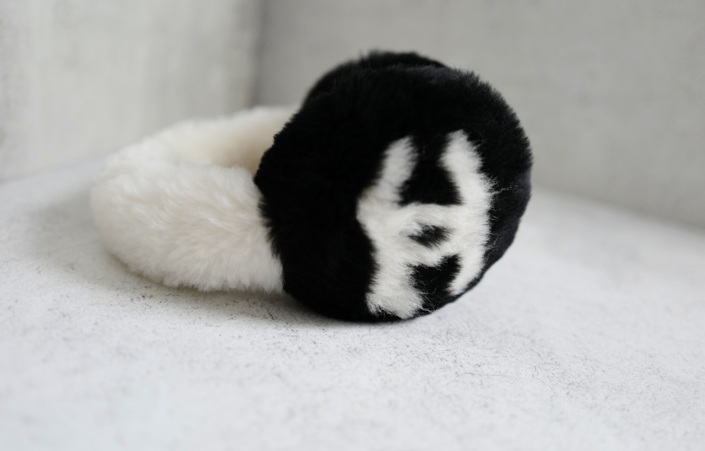 BNIB Chanel 25N Coco Neige Shearling Earmuffs in Black and White