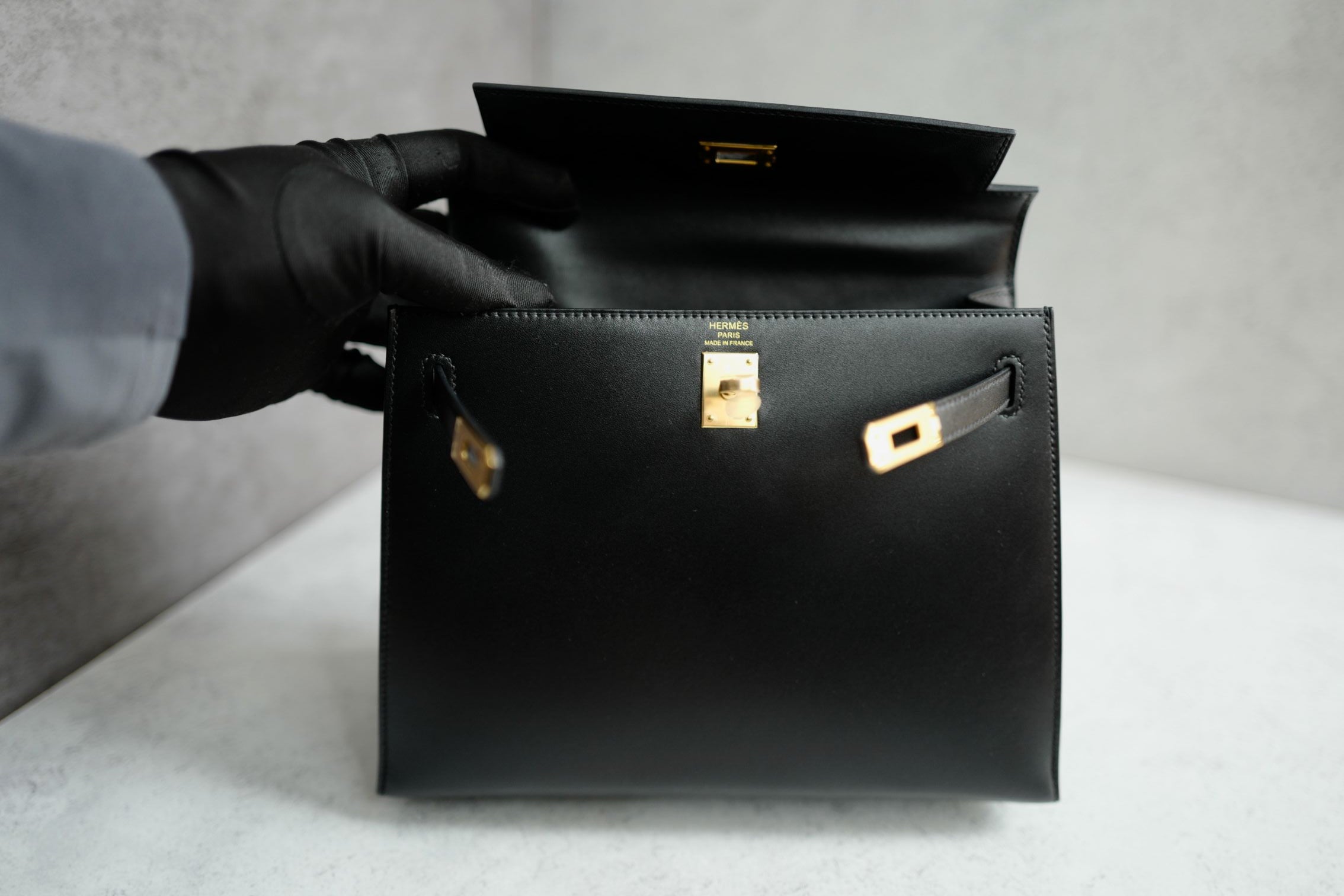 Hermes Kelly 25 Black Tadelakh Sellier Gold HW Complete Original Receipt NEW