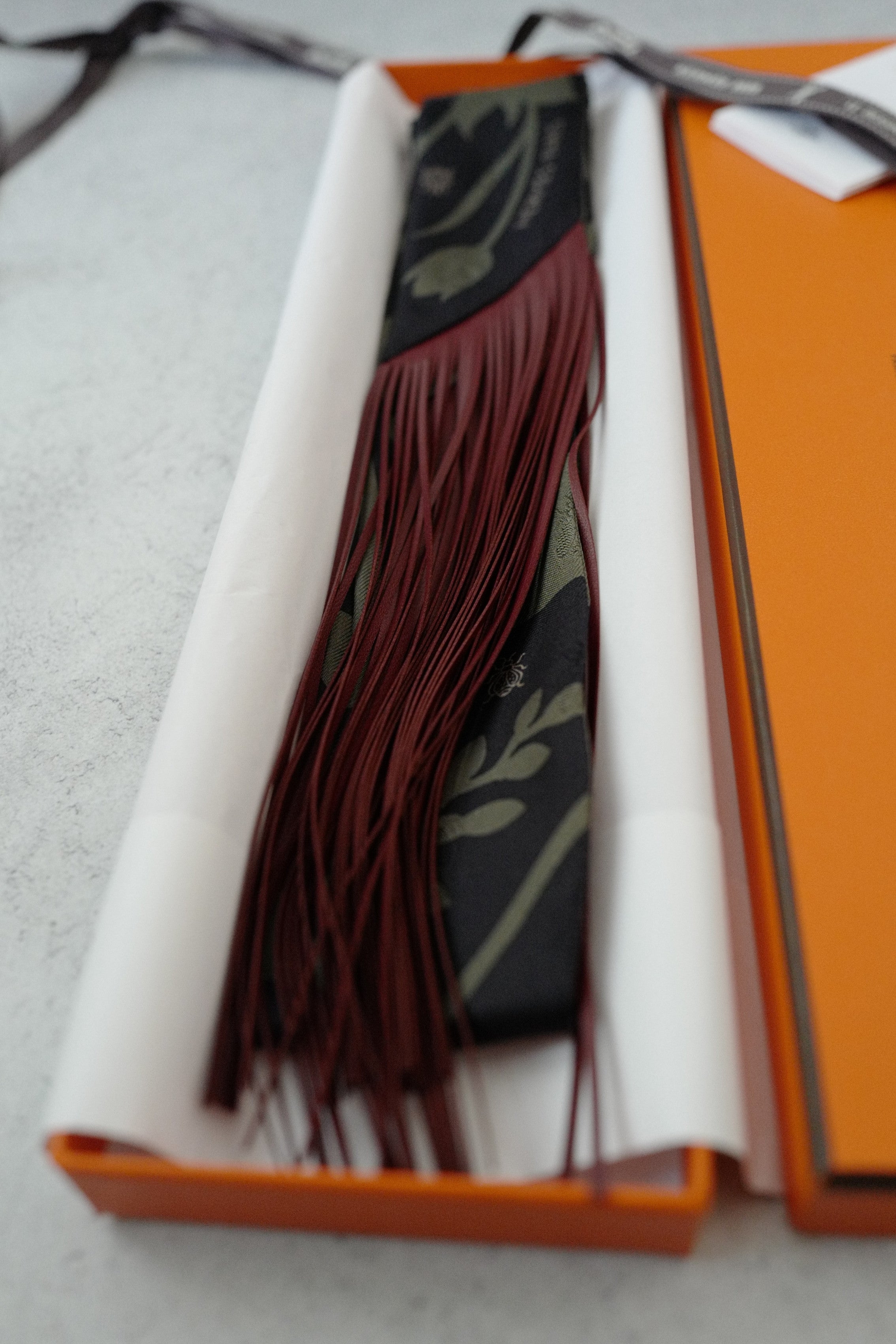 Hermès Twilly Bouquet Final Silk Noir Vert Loden with Leather Fringe