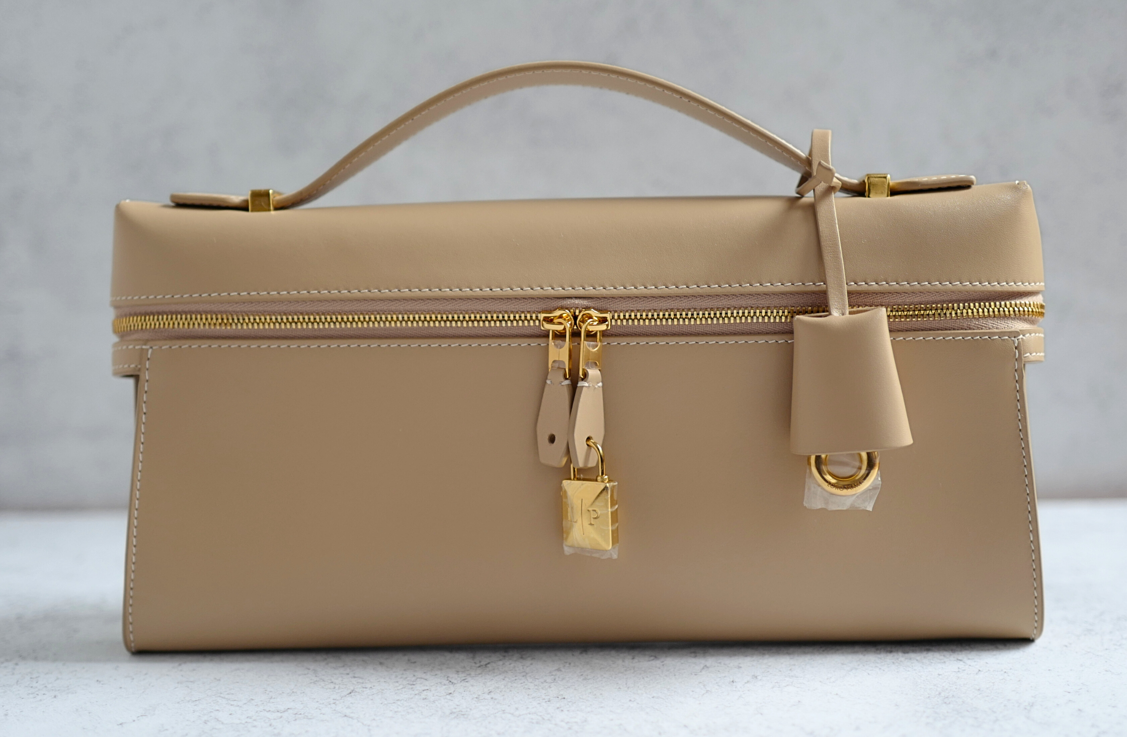 Loro Piana Extra Clutch L29 Light Mastic Calfskin with Sun Gold Hardware