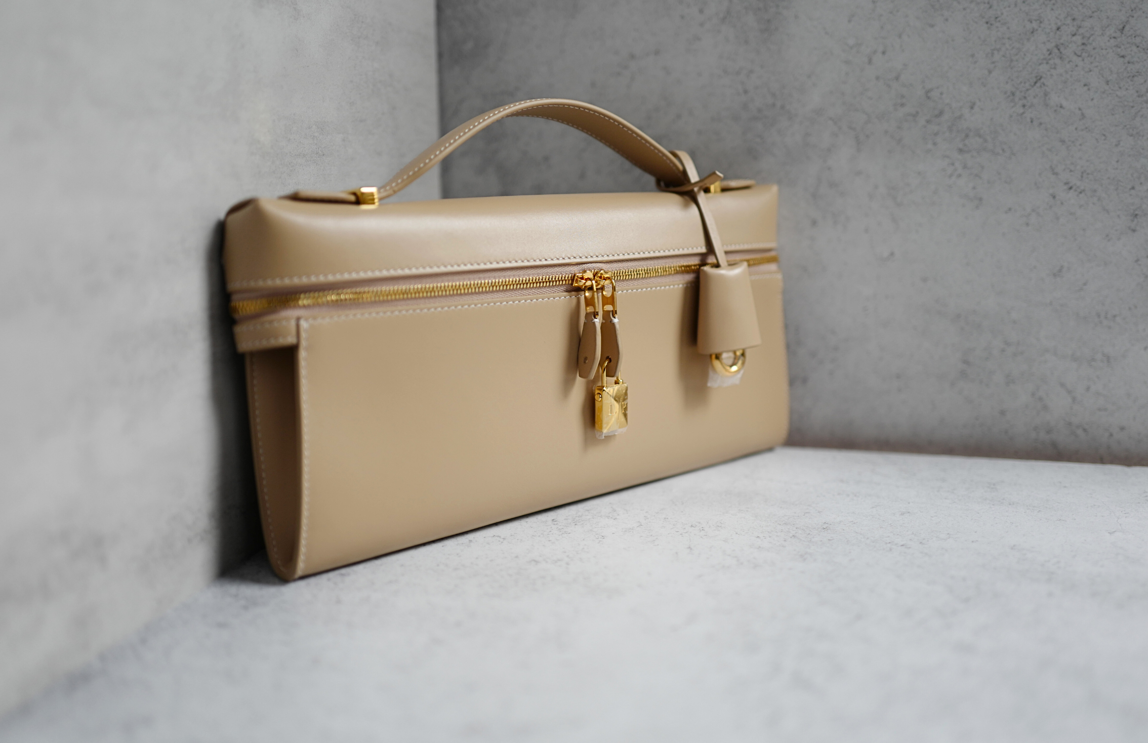 Loro Piana Extra Clutch L29 Light Mastic Calfskin with Sun Gold Hardware