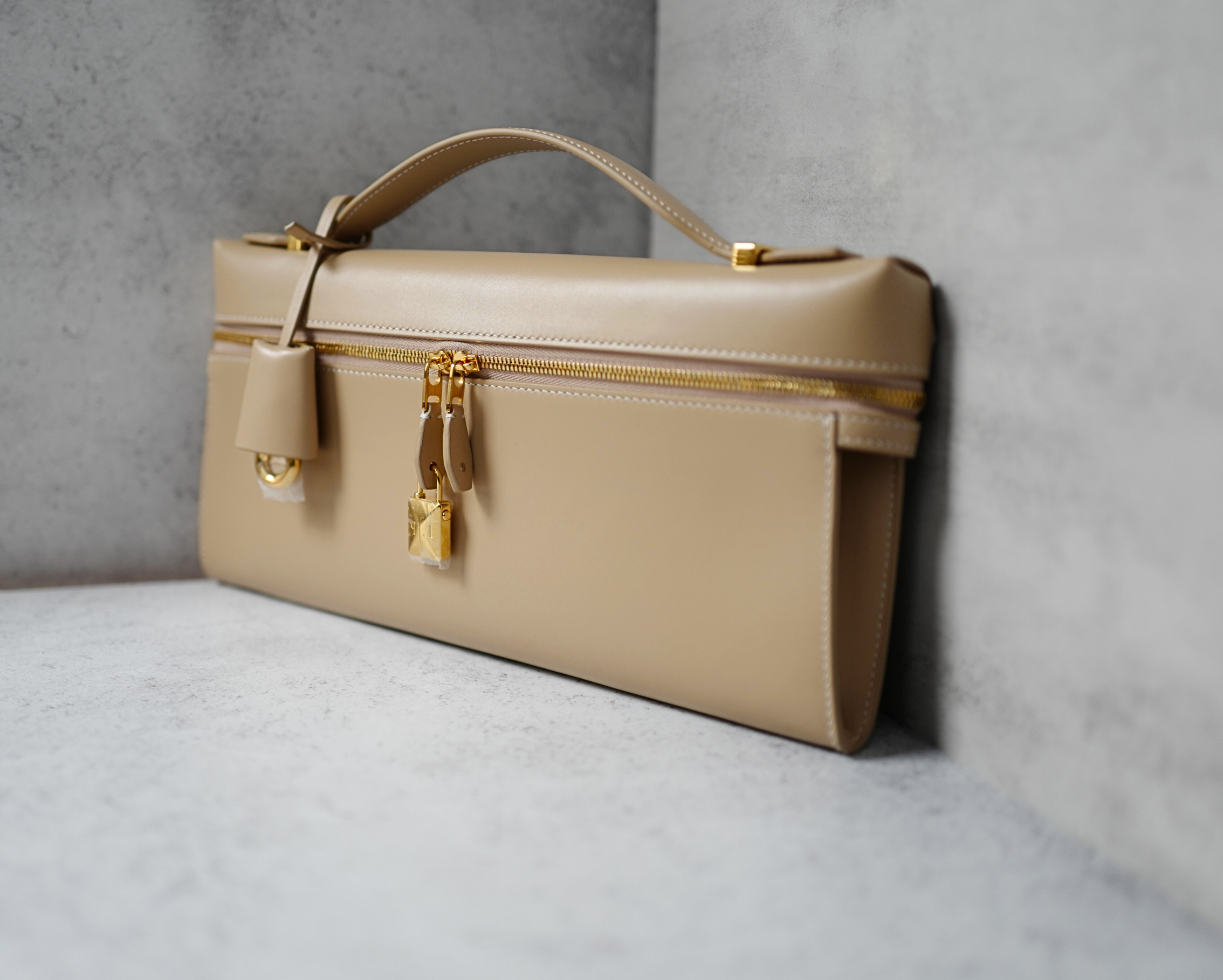 Loro Piana Extra Clutch L29 Light Mastic Calfskin with Sun Gold Hardware