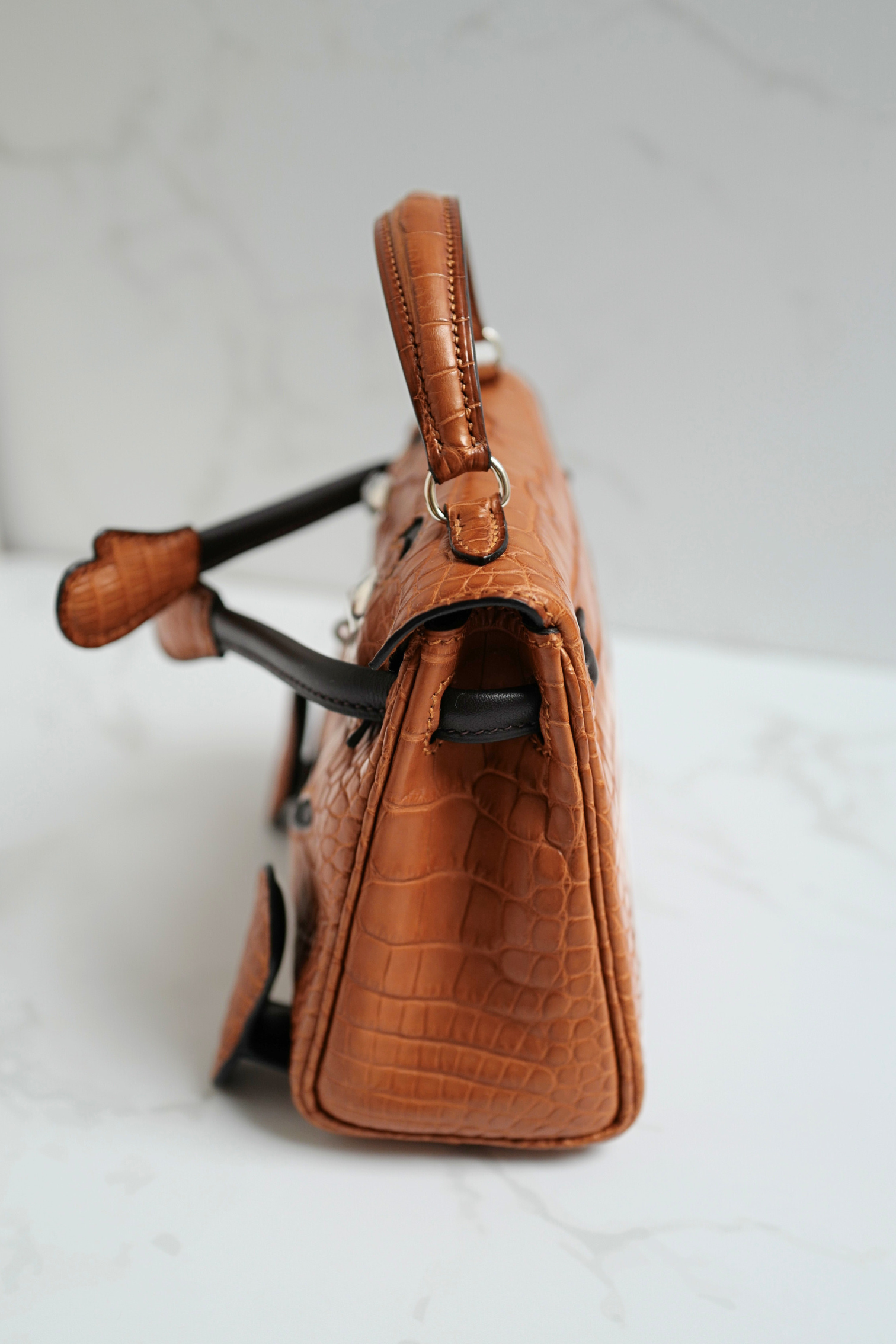 BNIB Hermès Kelly dole Gold Matte Crocodile Leather Handbag with Palladium Hardware