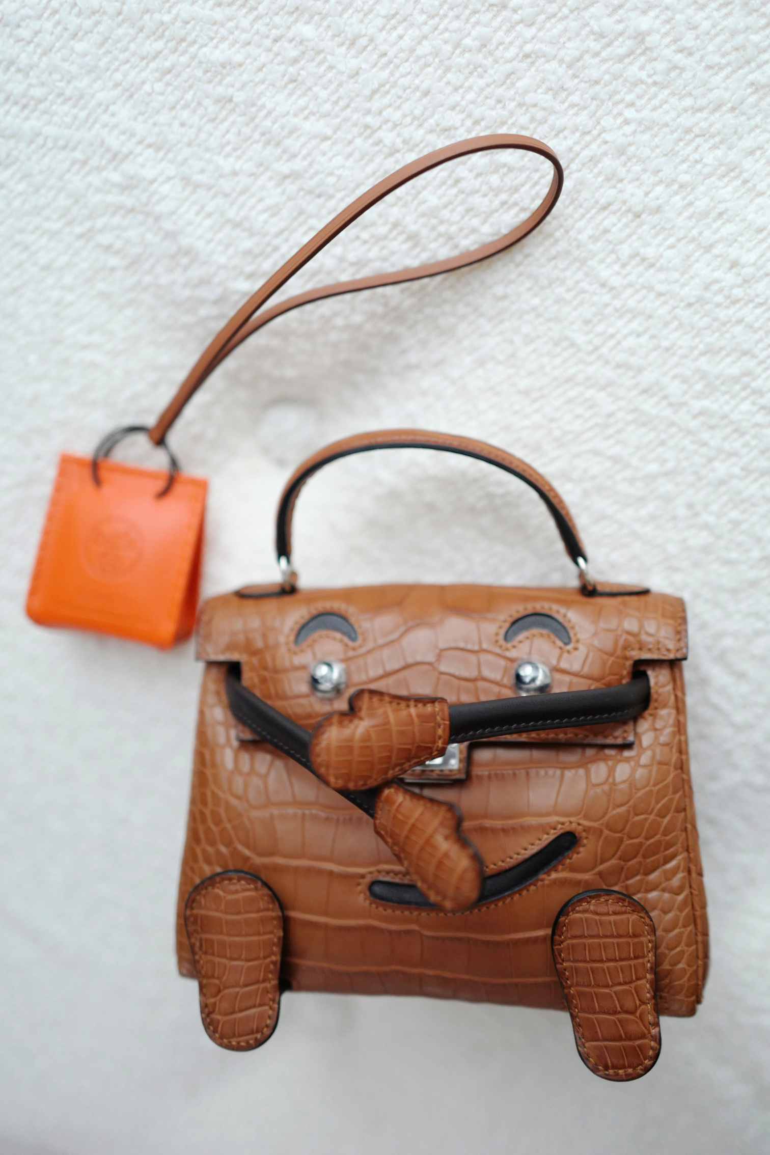 BNIB Hermès Kelly dole Gold Matte Crocodile Leather Handbag with Palladium Hardware