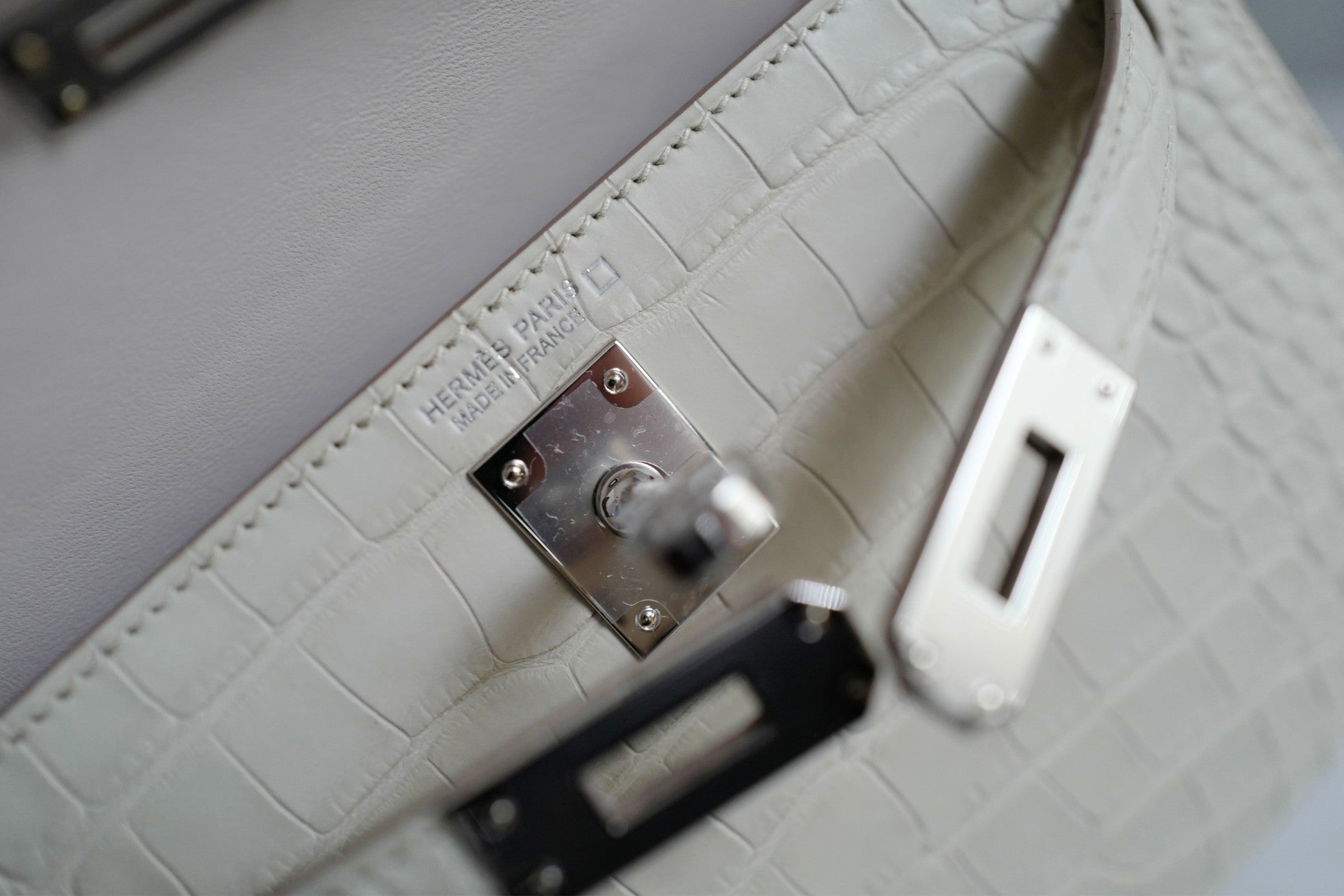 BNIB Hermès Mini Kelly 20 Beton Matte Crocodile with Palladium Hardware Stamp K