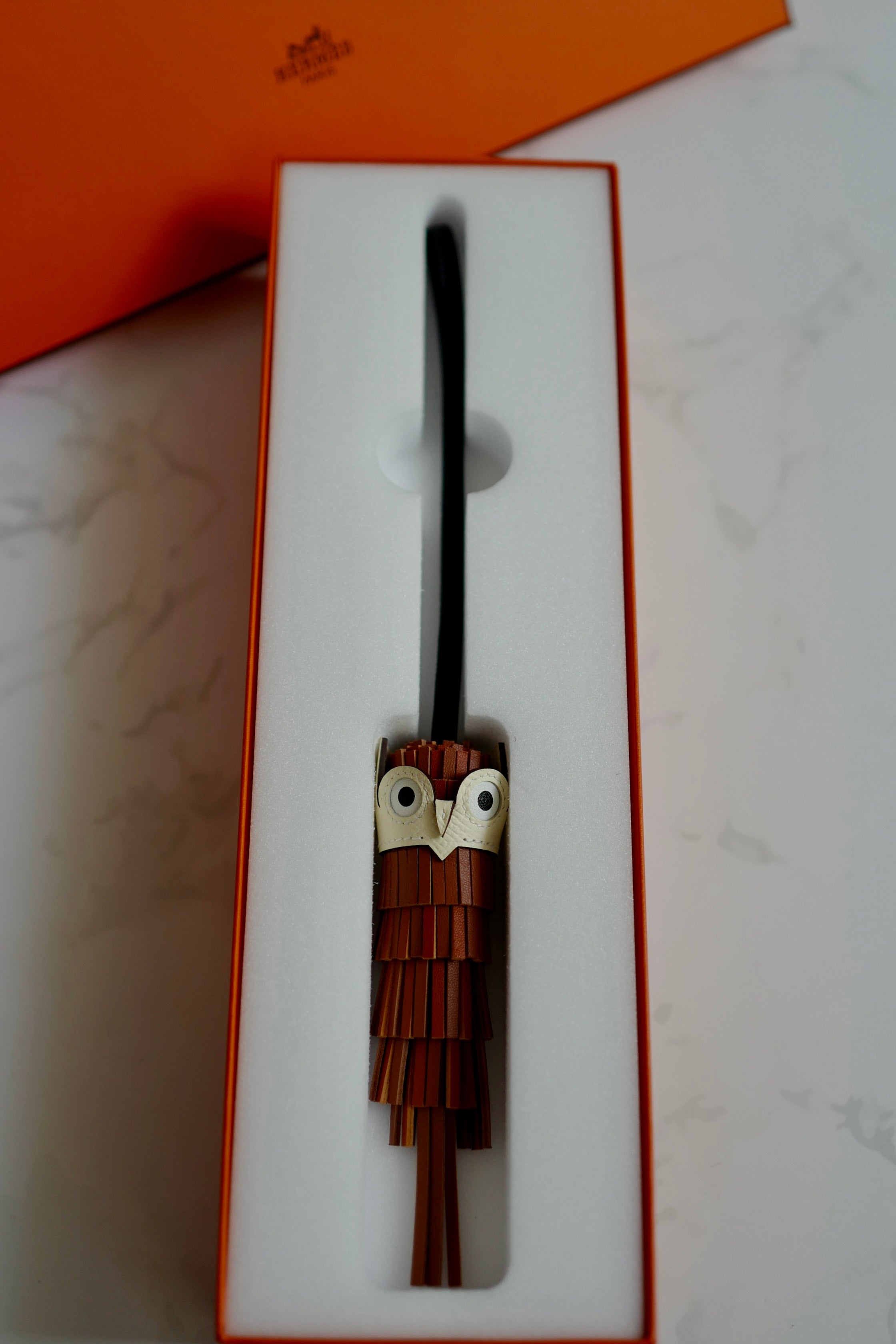 Brand New HERMÈS Chouette Charm Agneau Milo Swift in Gold / Pain d'épice / Noir