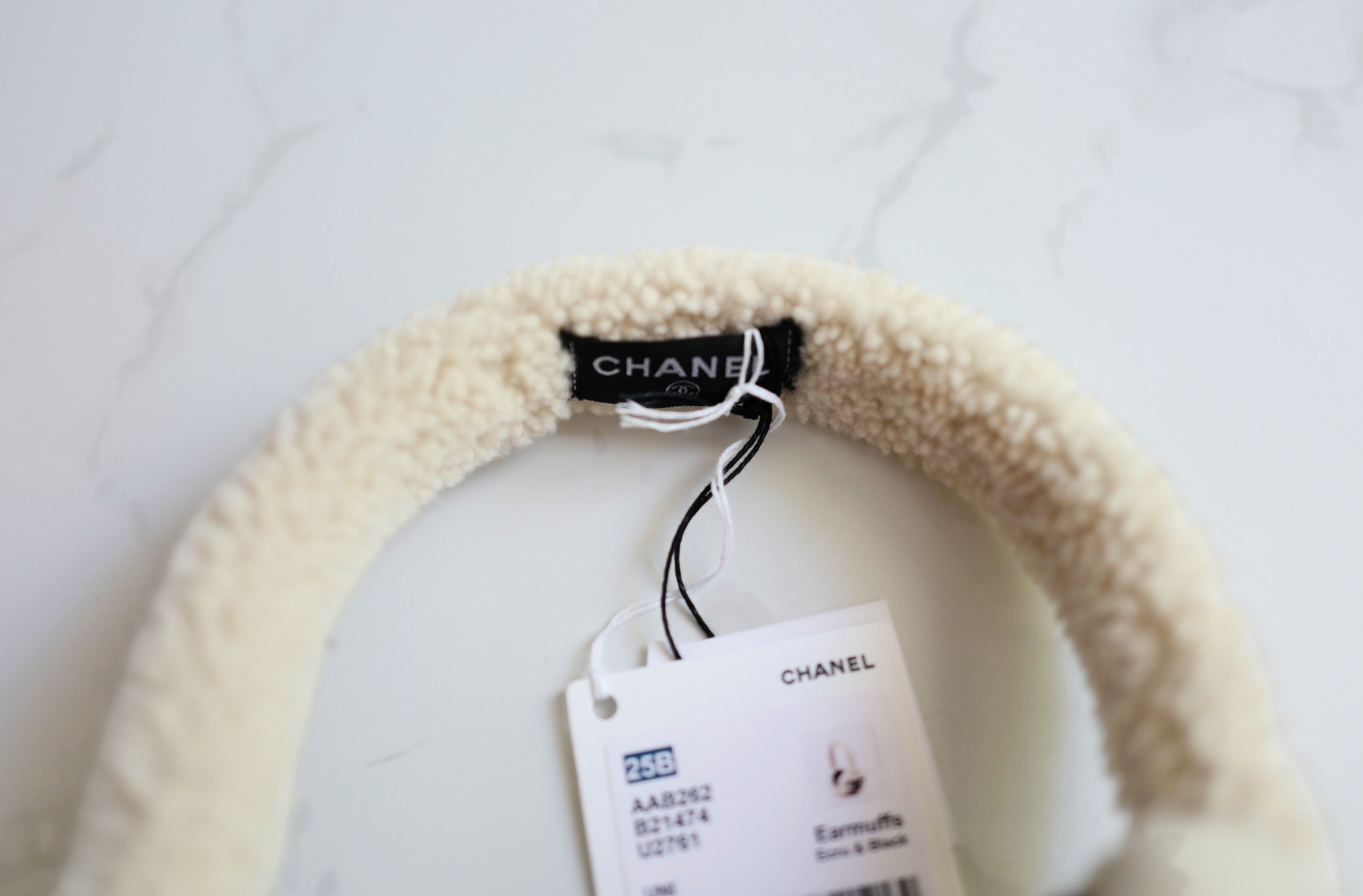 BNIB Chanel CC Earmuffs in Shearling Wool Ecru/Black