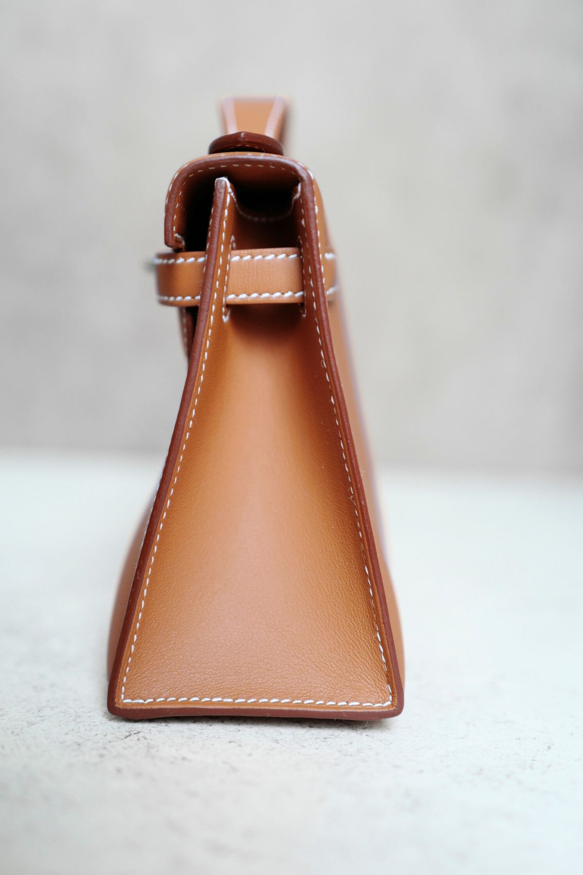 Hermès Kelly Pochette Gold Swift Leather Palladium Hardware K Stamp