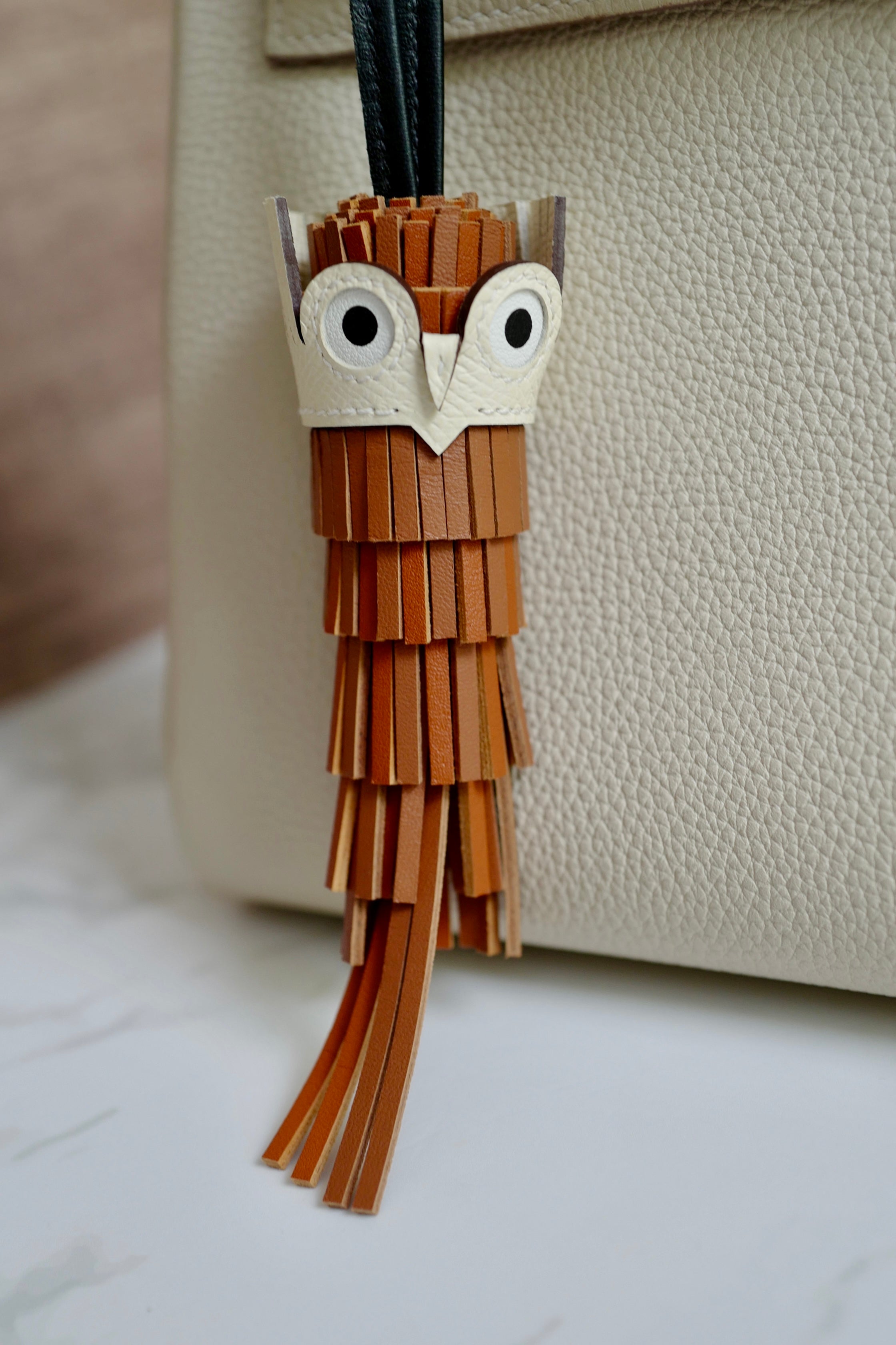 Brand New HERMÈS Chouette Charm Agneau Milo Swift in Gold / Pain d'épice / Noir
