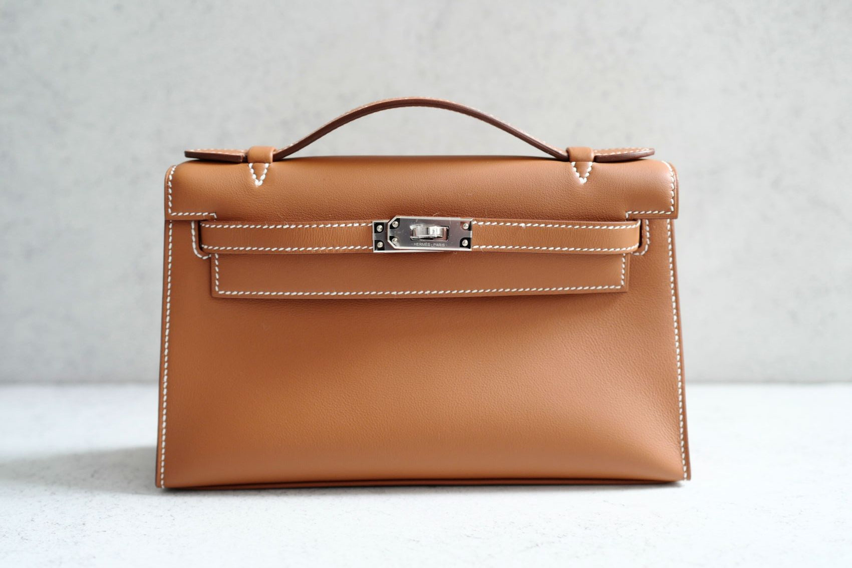 Hermès Kelly Pochette Gold Swift Leather Palladium Hardware K Stamp