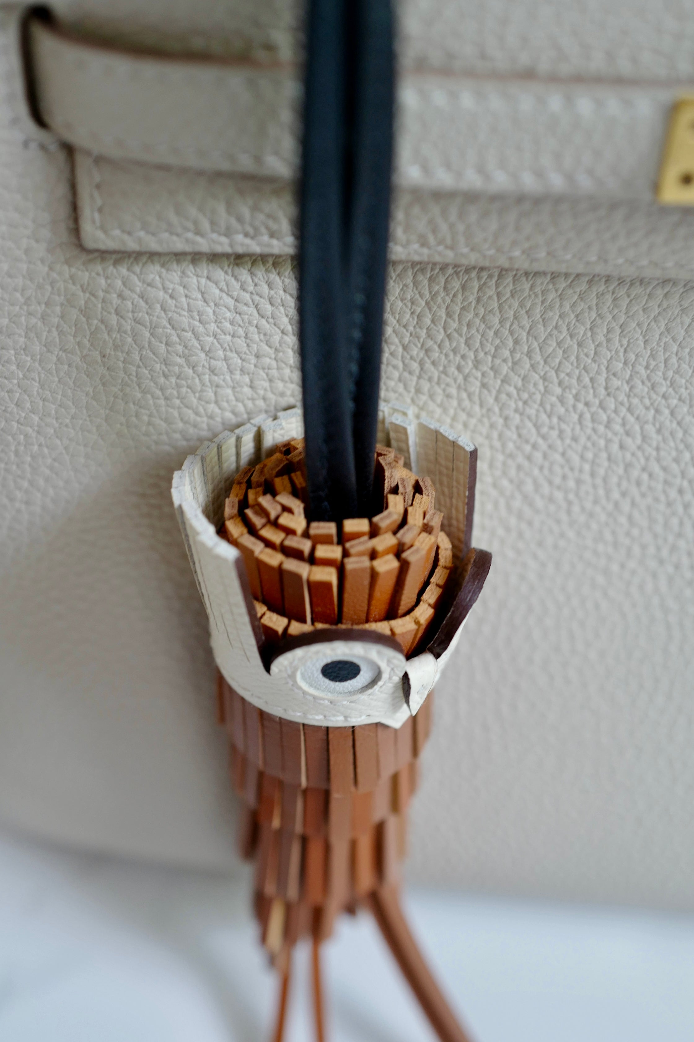 Brand New HERMÈS Chouette Charm Agneau Milo Swift in Gold / Pain d'épice / Noir
