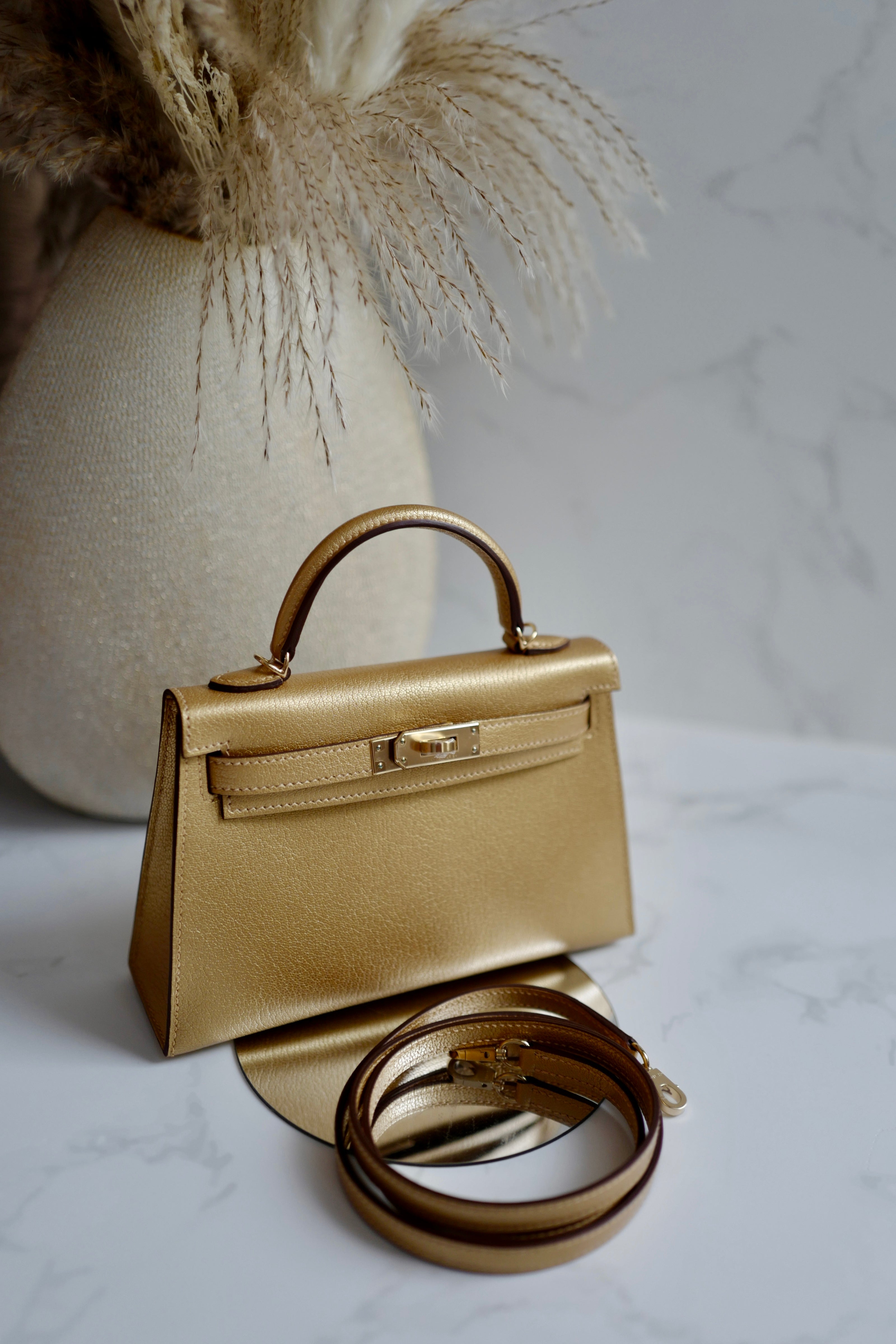 Hermès Mini Kelly Dore Metallic Gold Chèvre Olympic 2024 Champagne HW NEW