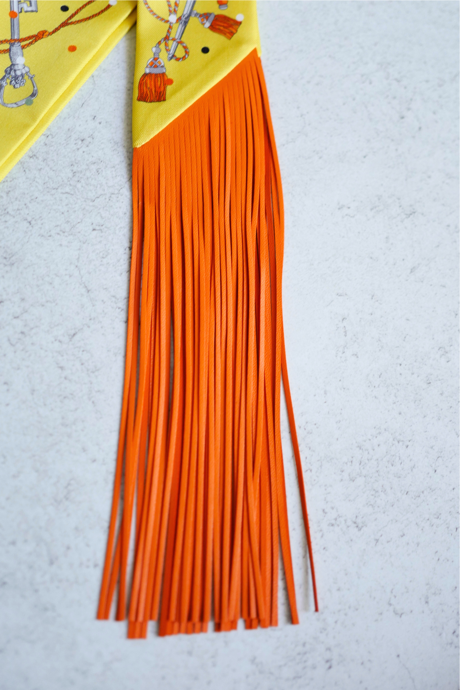 Hermès Twilly Les Cles a Pois Leather Fringes Jaune/Argent /Orange vif Silk