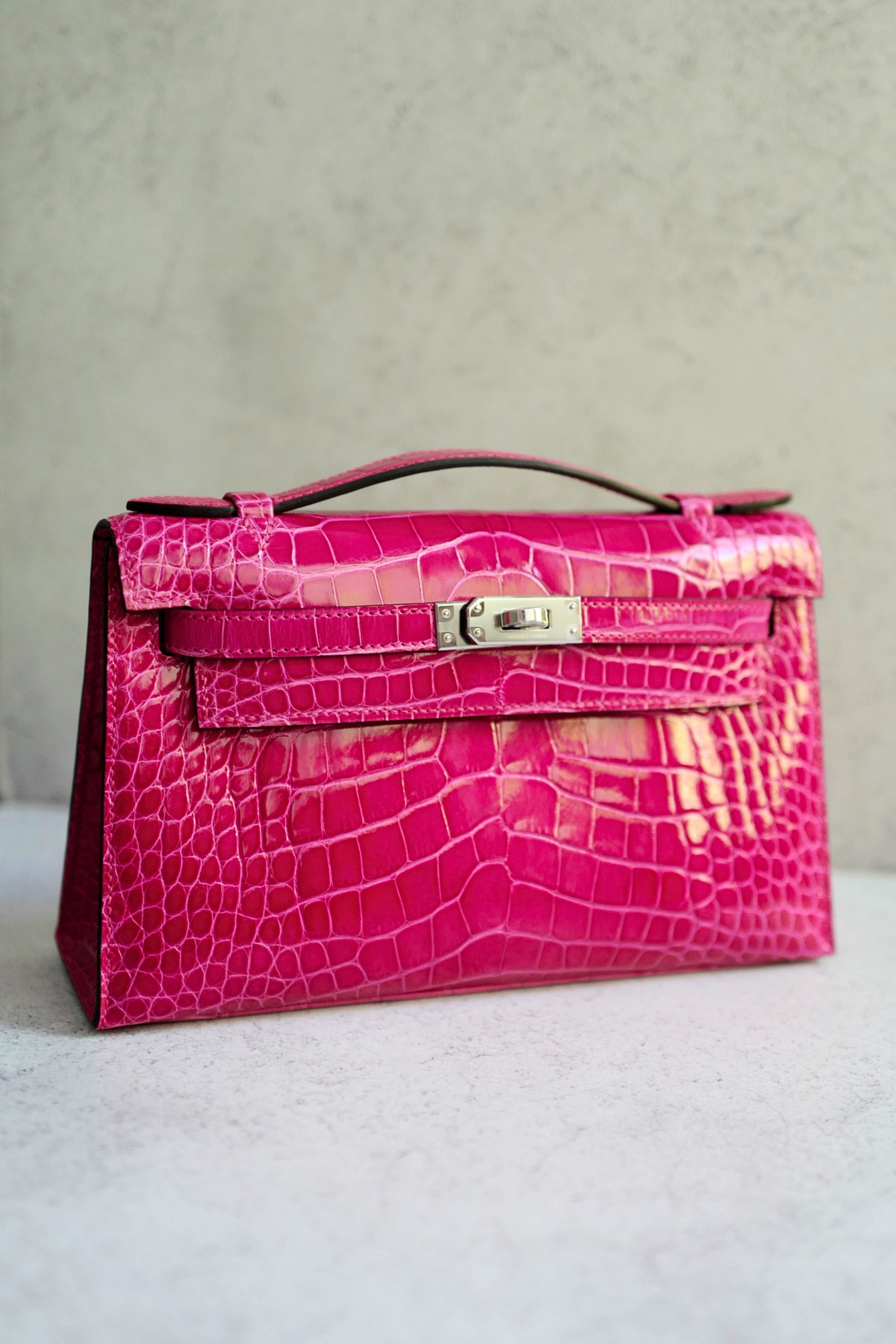 Hermès Kelly Mini Pochette Rose Mexico Alligator Mississippiensis Lisse PHW K Stamp