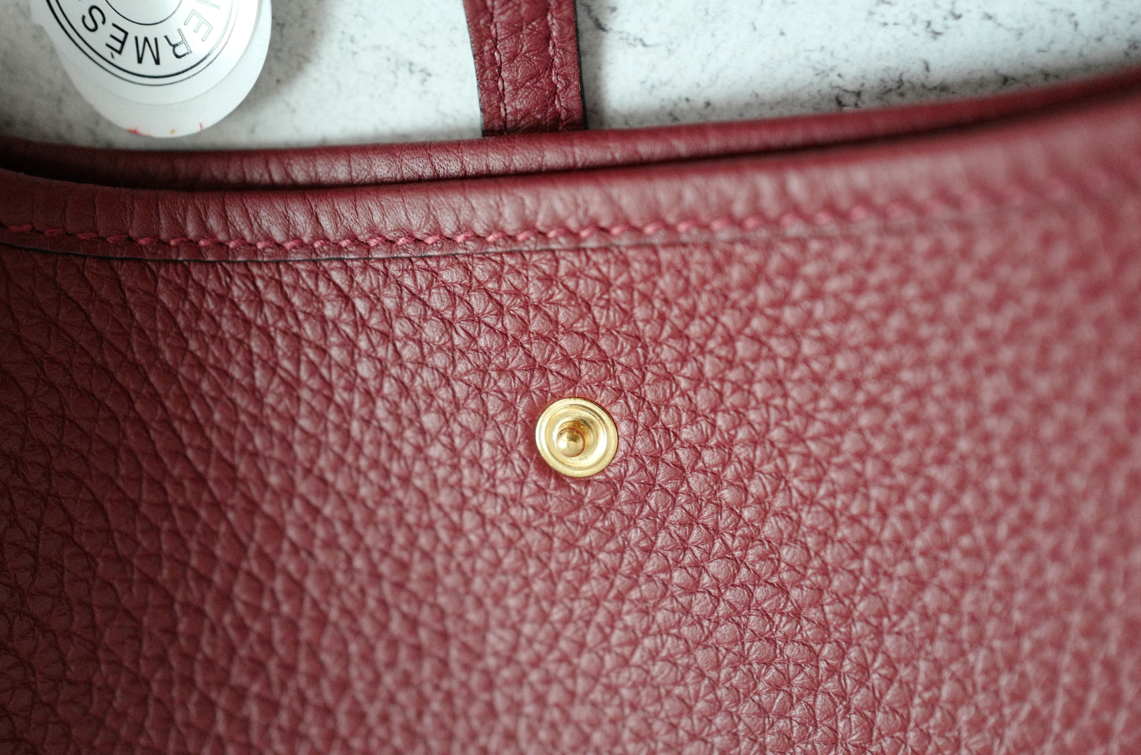 Hermès Mini Evelyne TPM Bag in Rouge H Clemence Leather with Gold Hardware