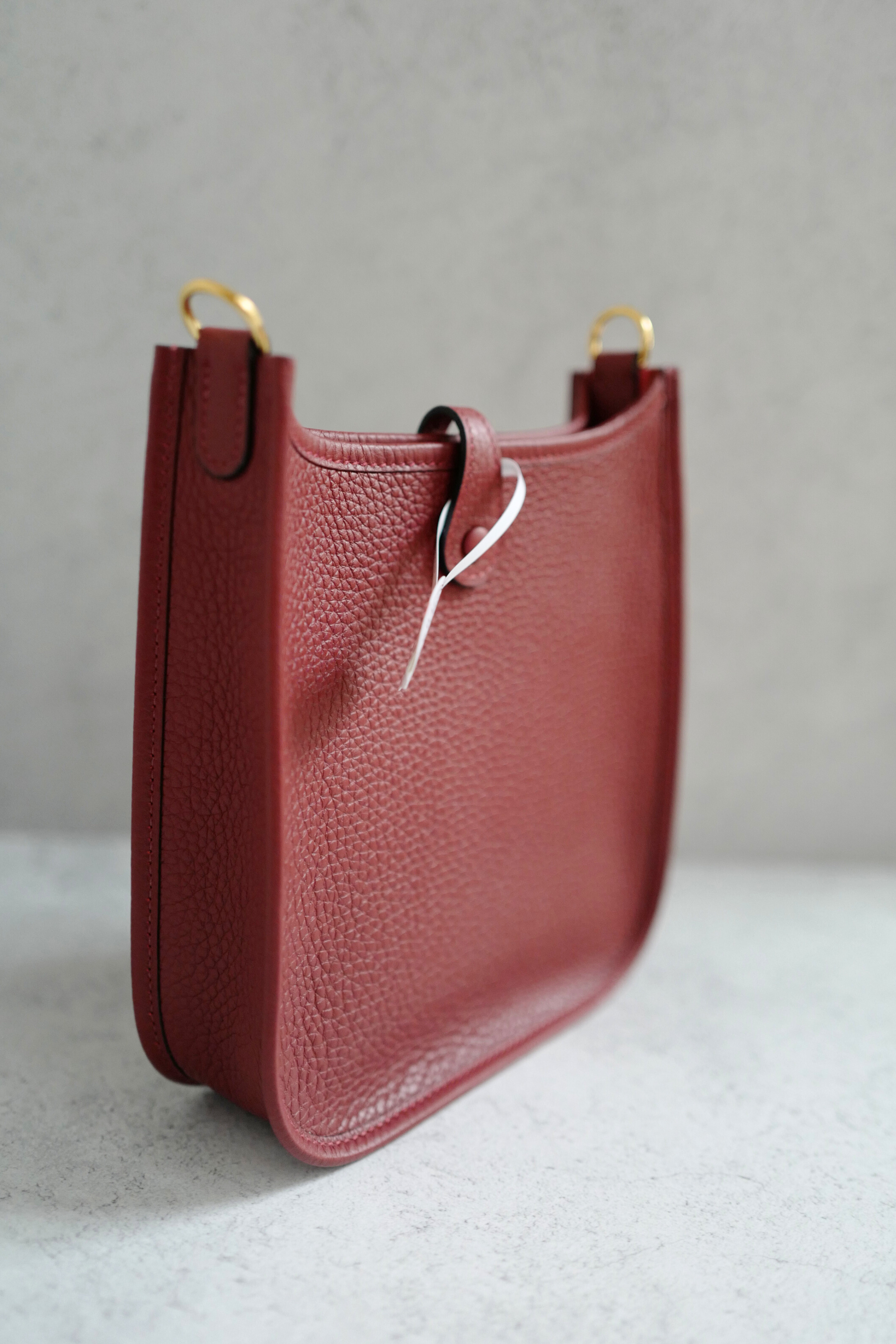 Hermès Mini Evelyne TPM Bag in Rouge H Clemence Leather with Gold Hardware