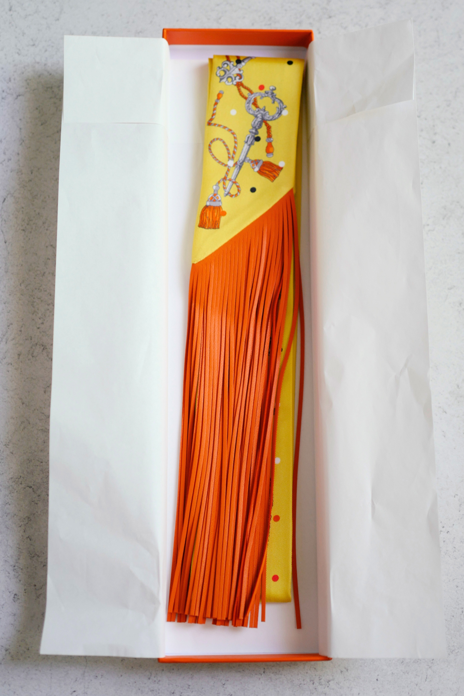 Hermès Twilly Les Cles a Pois Leather Fringes Jaune/Argent /Orange vif Silk