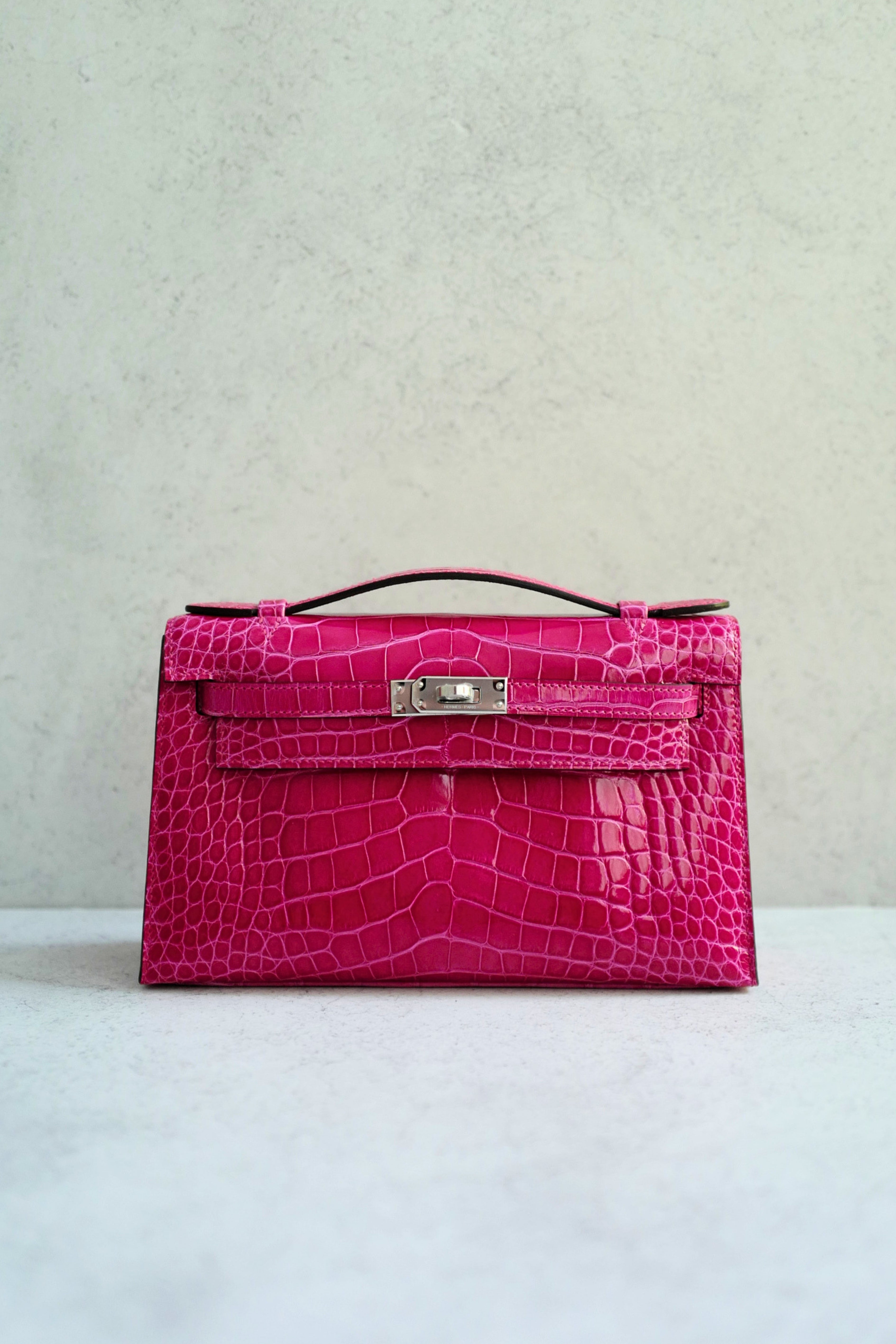 Hermès Kelly Mini Pochette Rose Mexico Alligator Mississippiensis Lisse PHW K Stamp