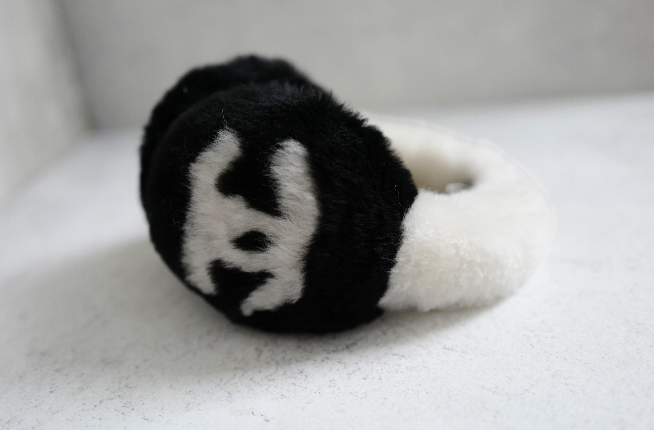 BNIB Chanel 25N Coco Neige Shearling Earmuffs in Black and White