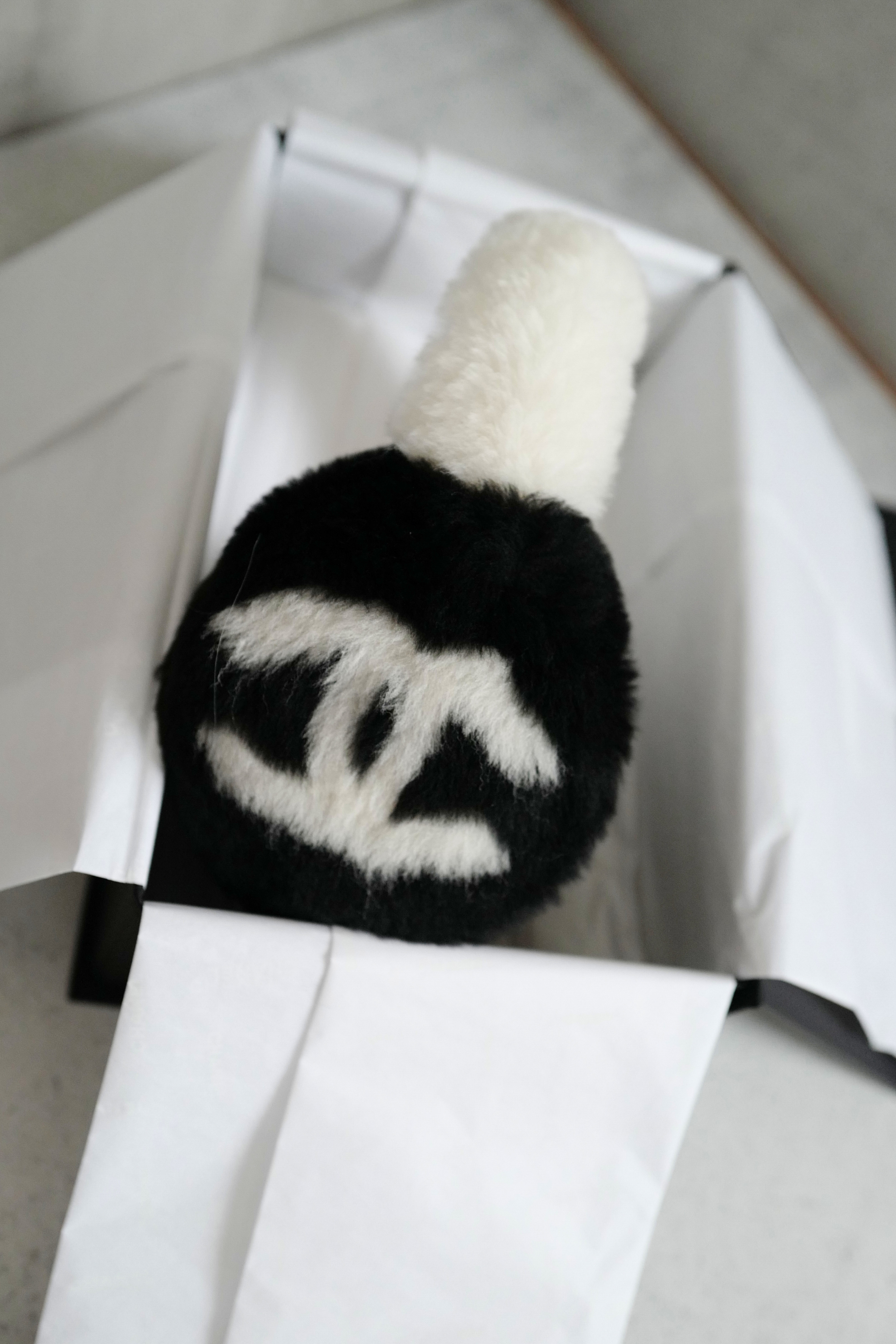 BNIB Chanel 25N Coco Neige Shearling Earmuffs in Black and White