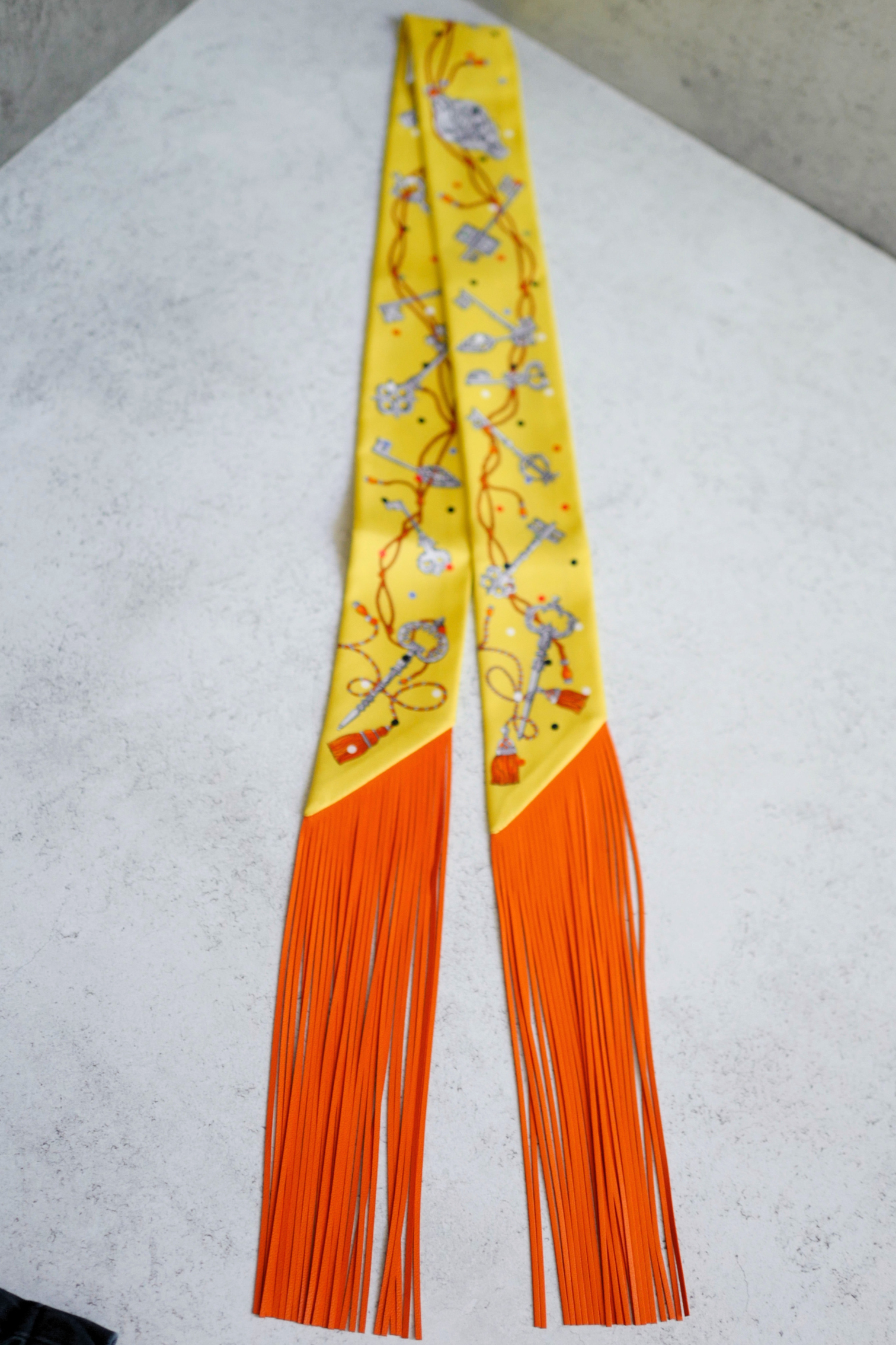 Hermès Twilly Les Cles a Pois Leather Fringes Jaune/Argent /Orange vif Silk