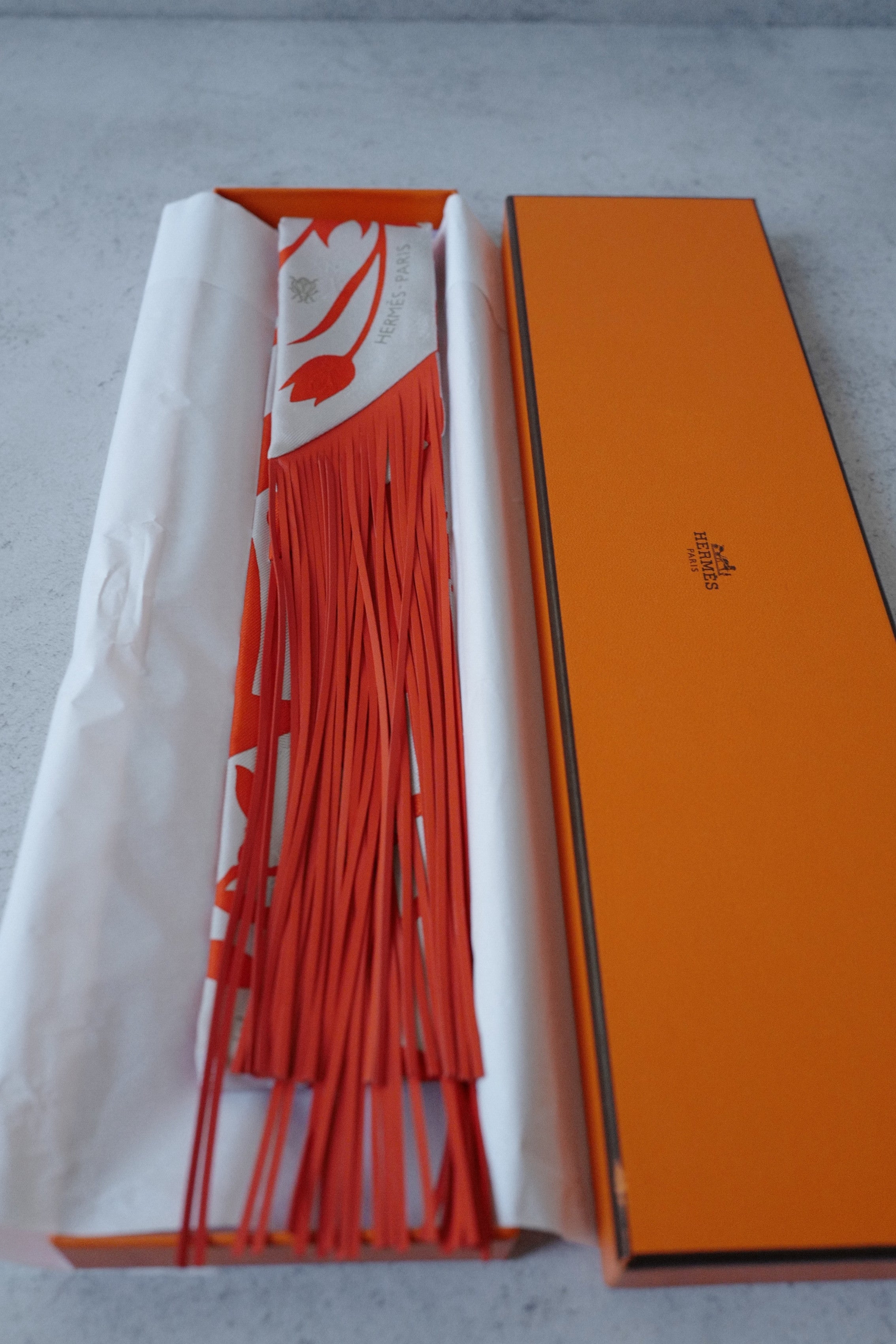 Hermès Twilly Bouquet Final Silk Gris Perle Vermillon with Leather Fringe
