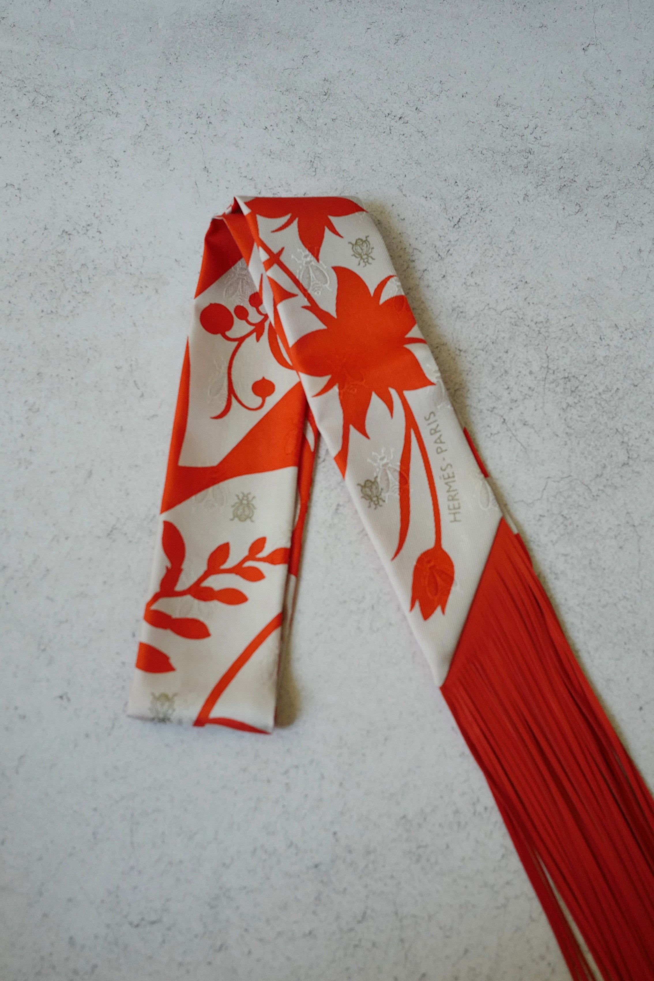 Hermès Twilly Bouquet Final Silk Gris Perle Vermillon with Leather Fringe