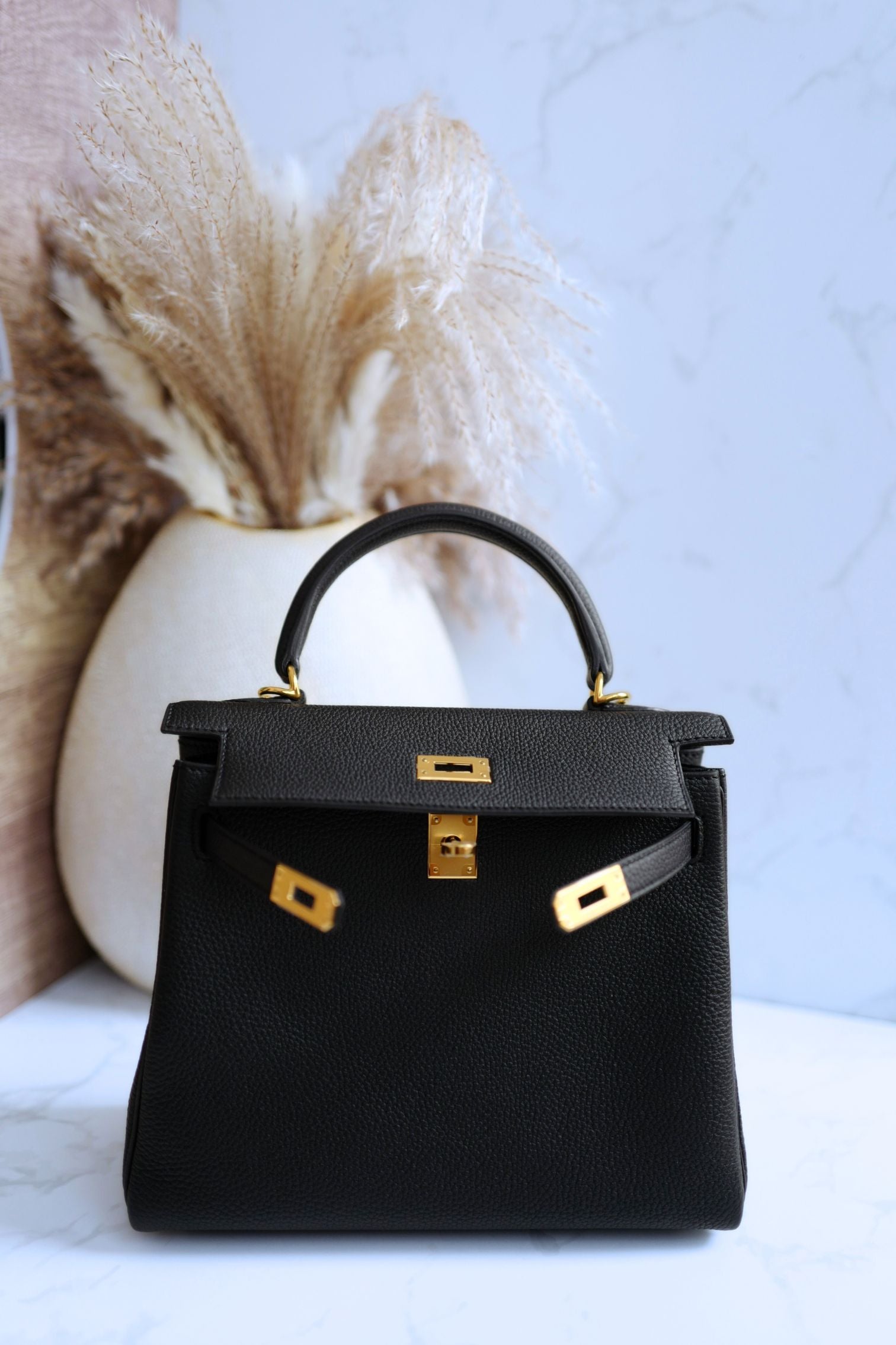 Hermès Kelly 25 Retourne Black Togo Leather Gold Hardware 2025