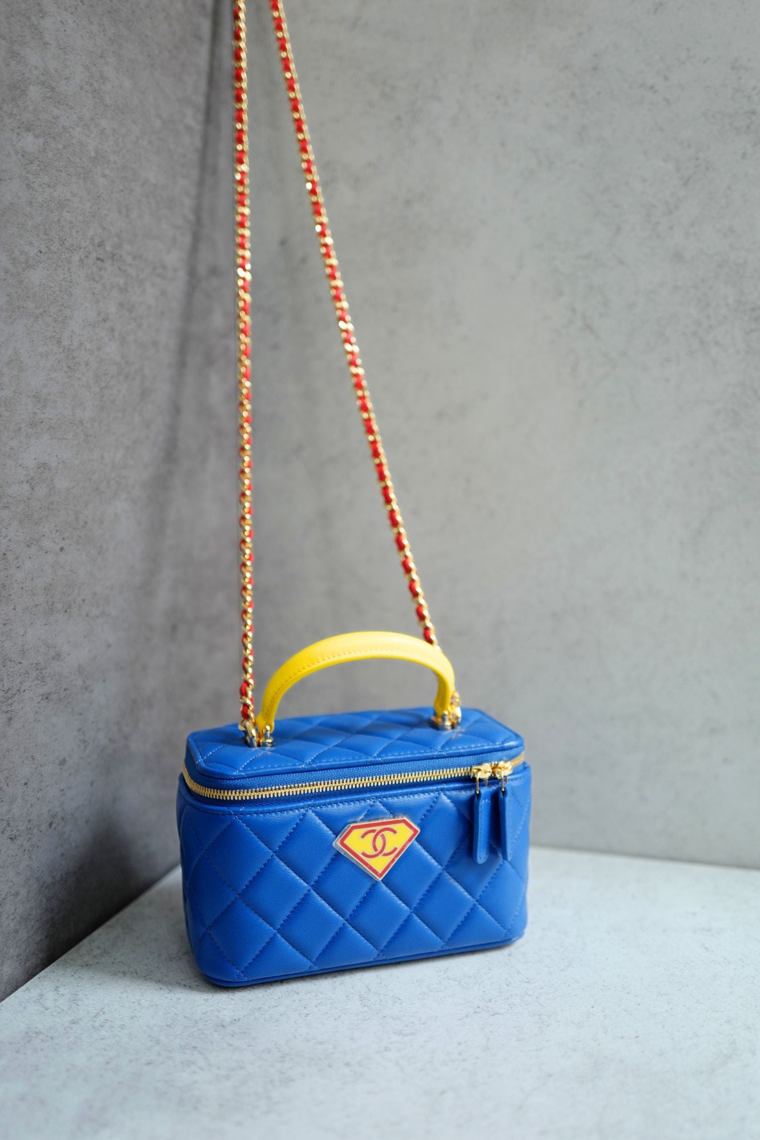 Chanel 26A Long Vanity Superman With Chain Lambskin Blue/Yellow/Red Gold HW
