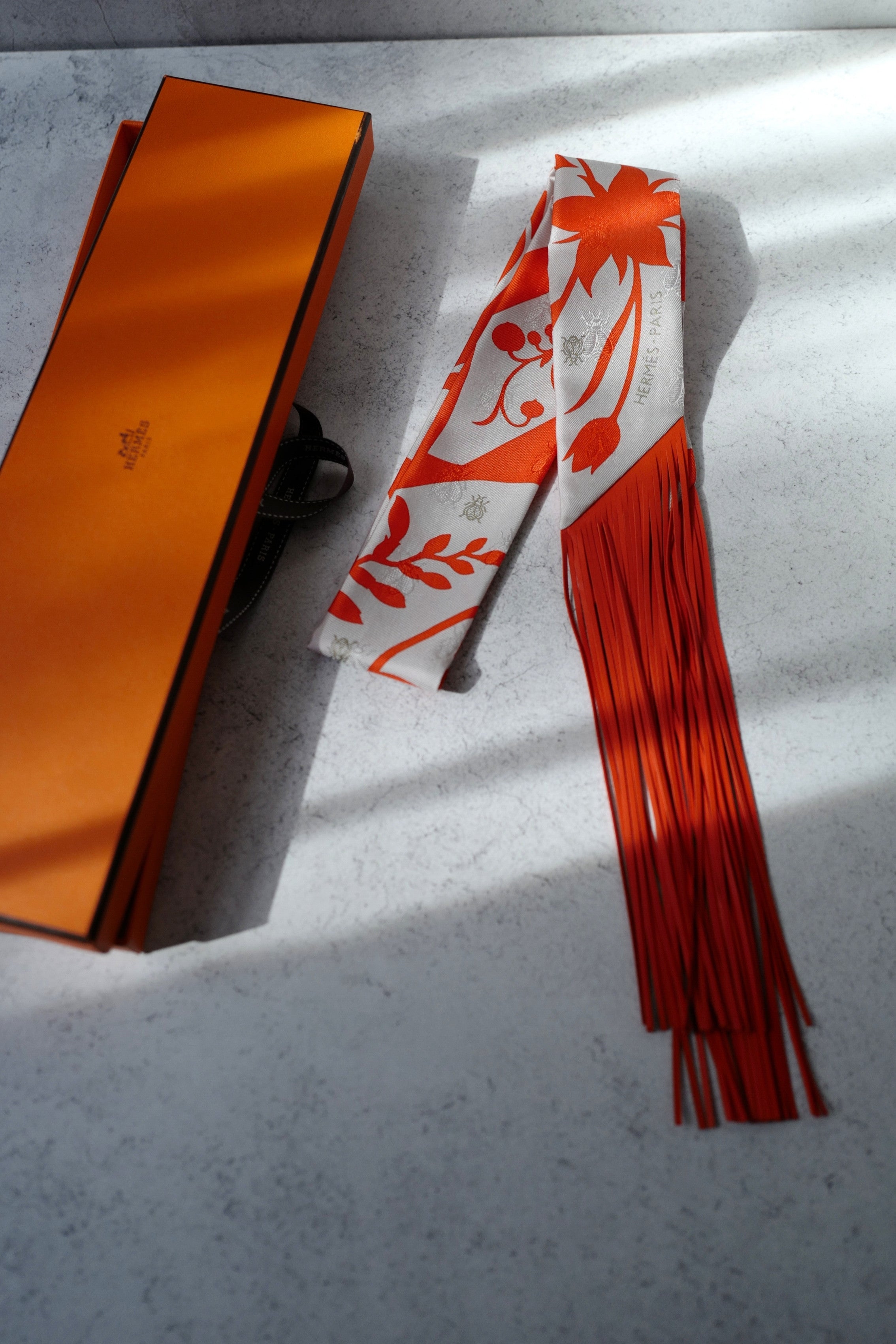 Hermès Twilly Bouquet Final Silk Gris Perle Vermillon with Leather Fringe