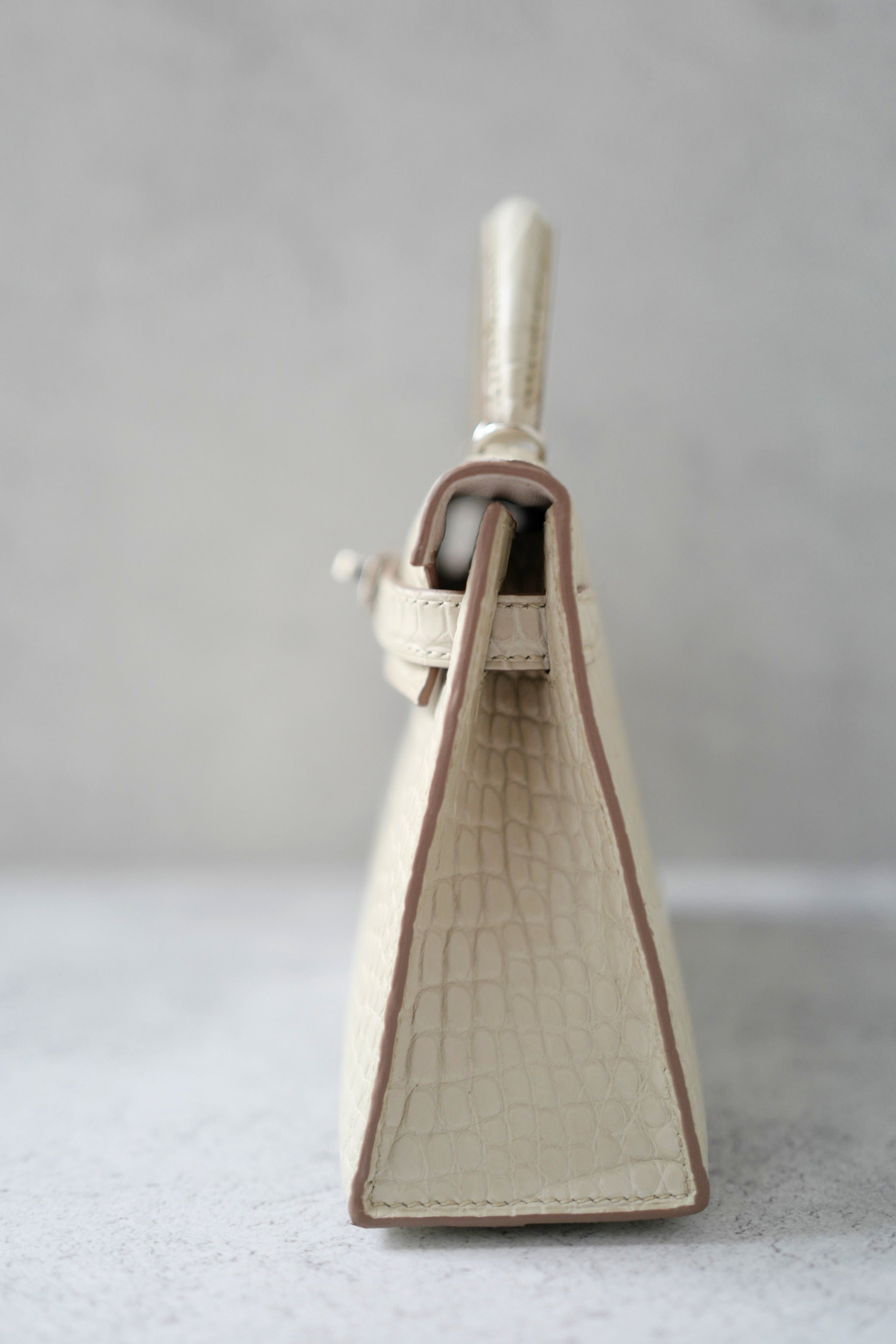 BNIB Hermès Mini Kelly 20 Beton Matte Crocodile with Palladium Hardware Stamp K