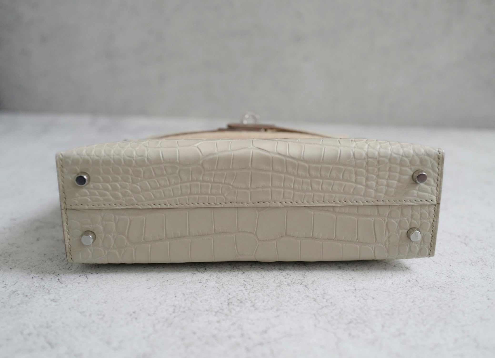 BNIB Hermès Mini Kelly 20 Beton Matte Crocodile with Palladium Hardware Stamp K