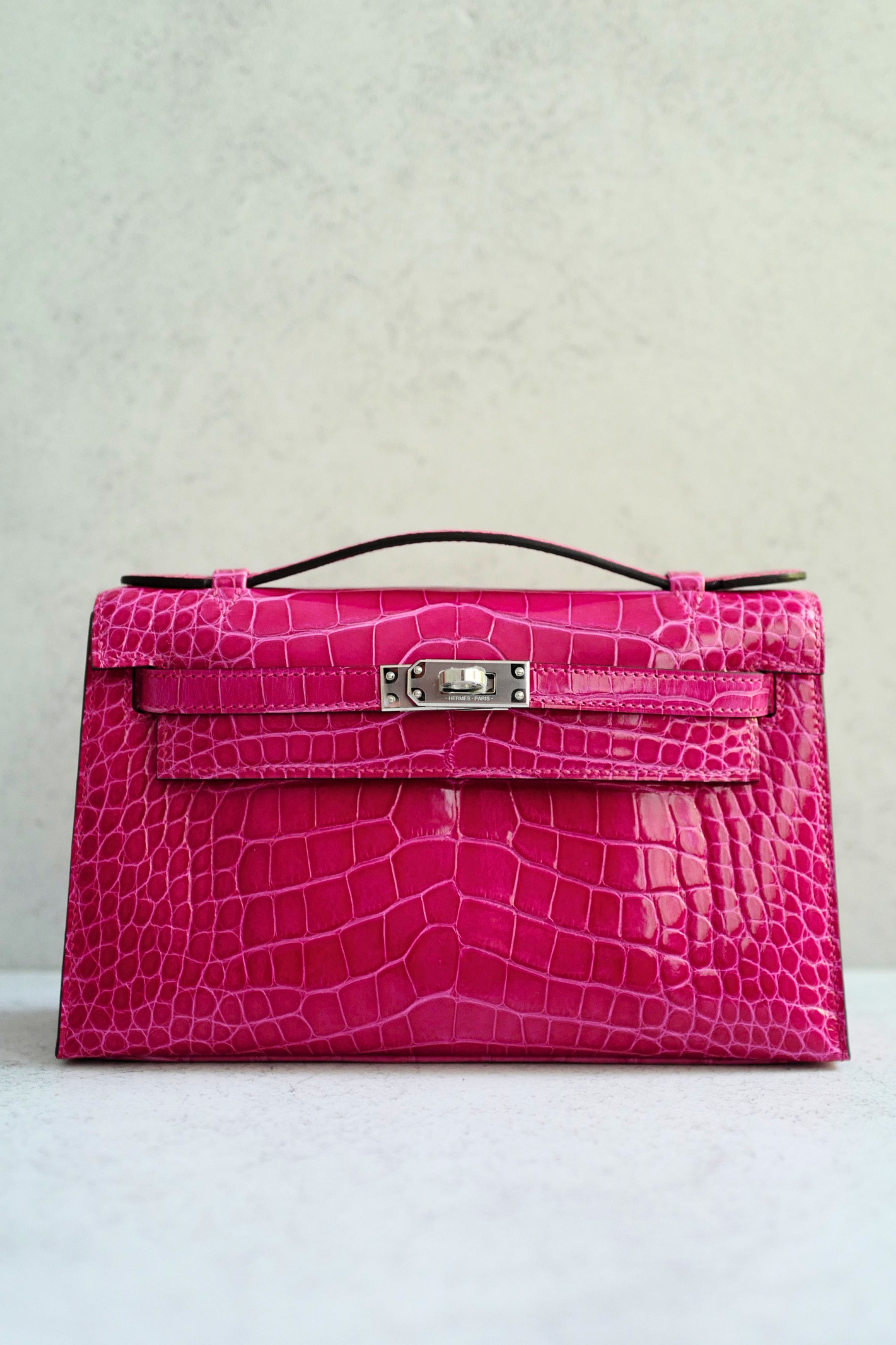 Hermès Kelly Mini Pochette Rose Mexico Alligator Mississippiensis Lisse PHW K Stamp