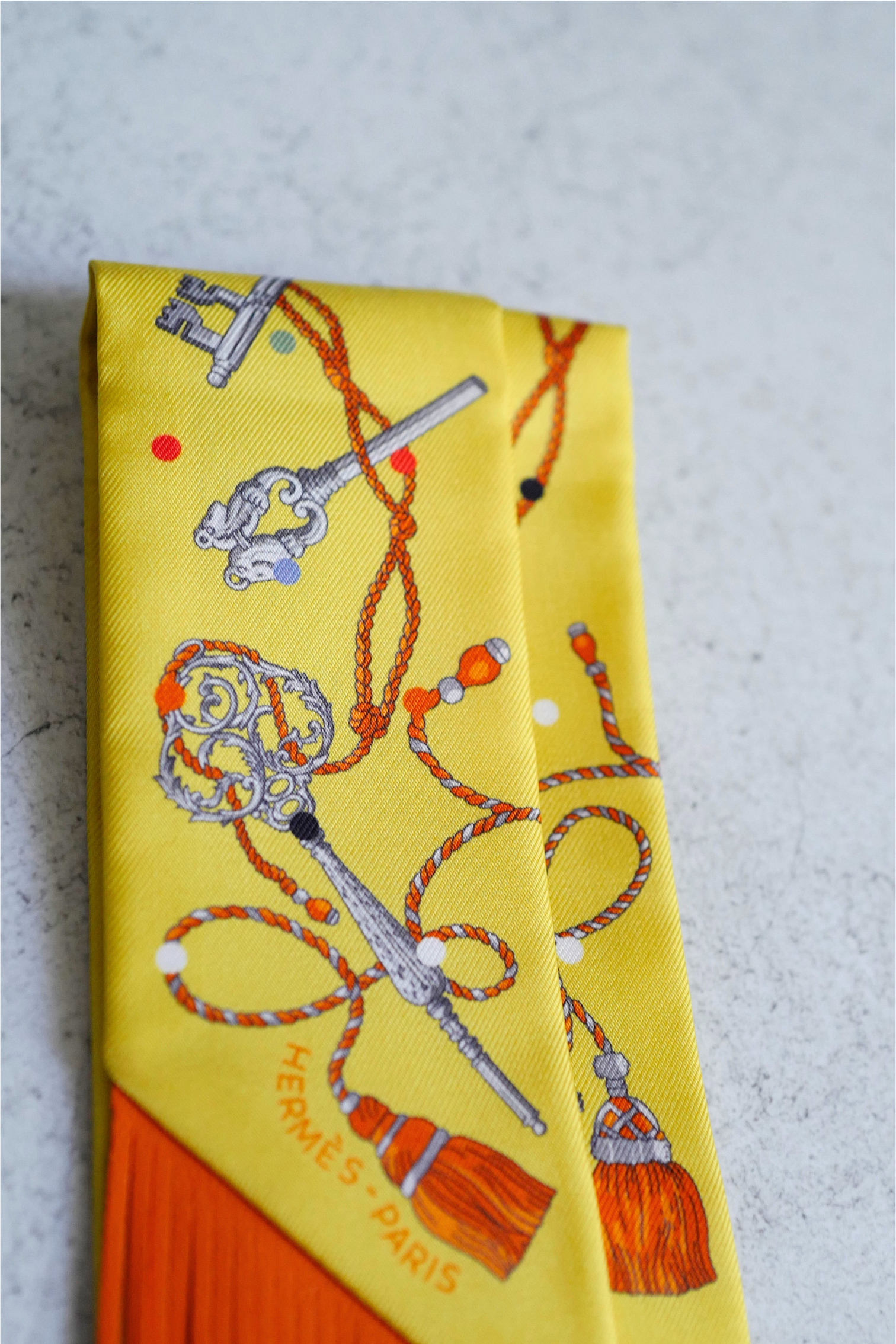 Hermès Twilly Les Cles a Pois Leather Fringes Jaune/Argent /Orange vif Silk