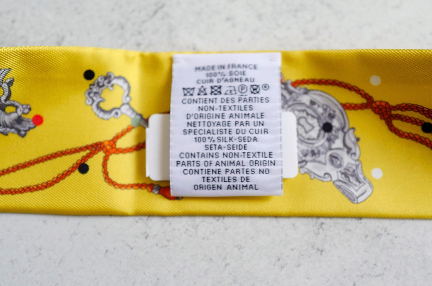 Hermès Twilly Les Cles a Pois Leather Fringes Jaune/Argent /Orange vif Silk