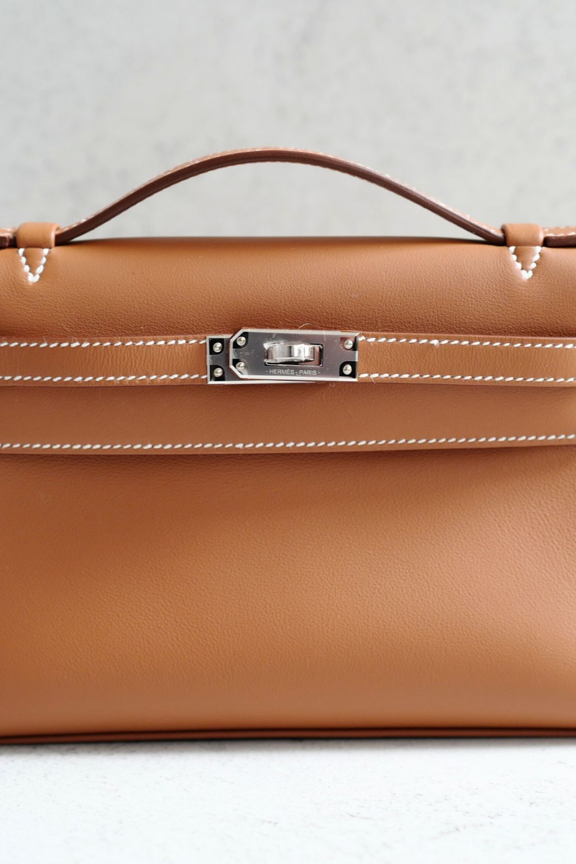 Hermès Kelly Pochette Gold Swift Leather Palladium Hardware K Stamp