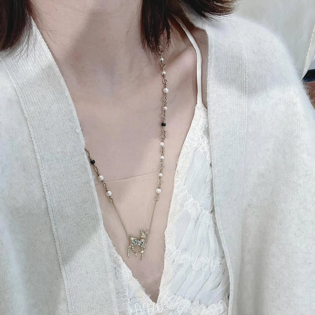 Chanel CC Deer Long Pendant Necklace Gold and Faux Pearl