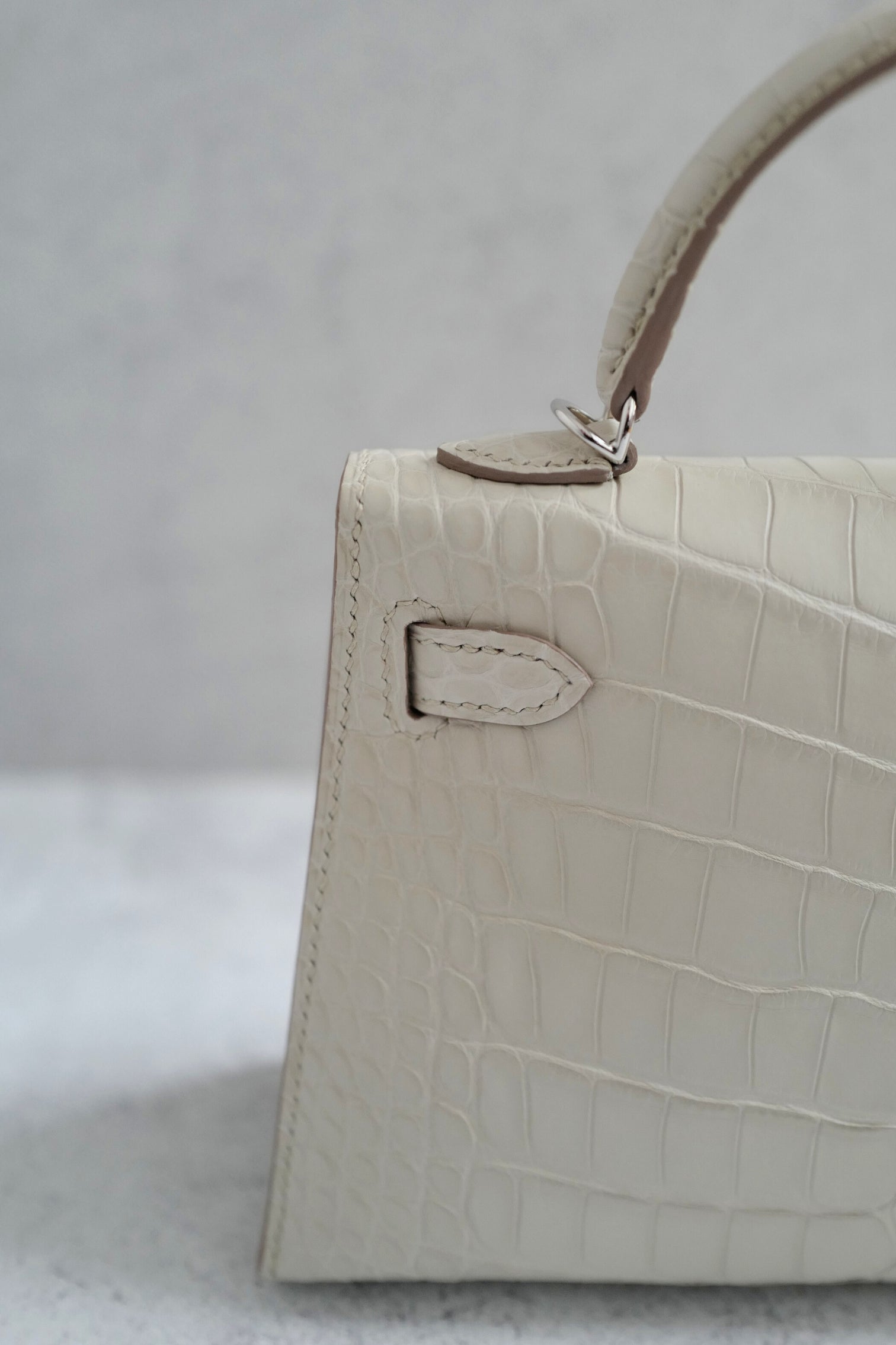 BNIB Hermès Mini Kelly 20 Beton Matte Crocodile with Palladium Hardware Stamp K